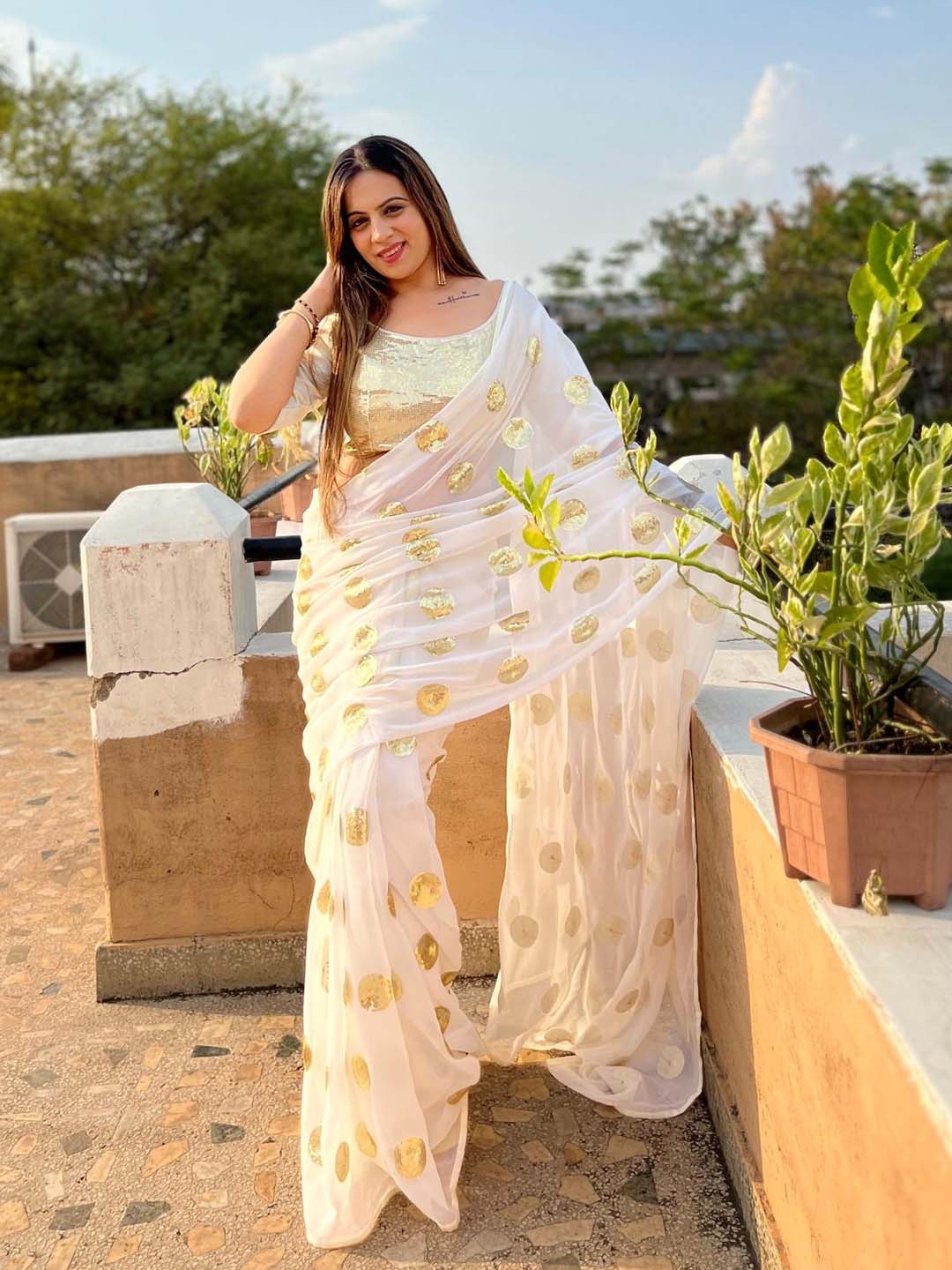 

Ekasya Ethnic Motifs Embellished Sequinned Saree, White