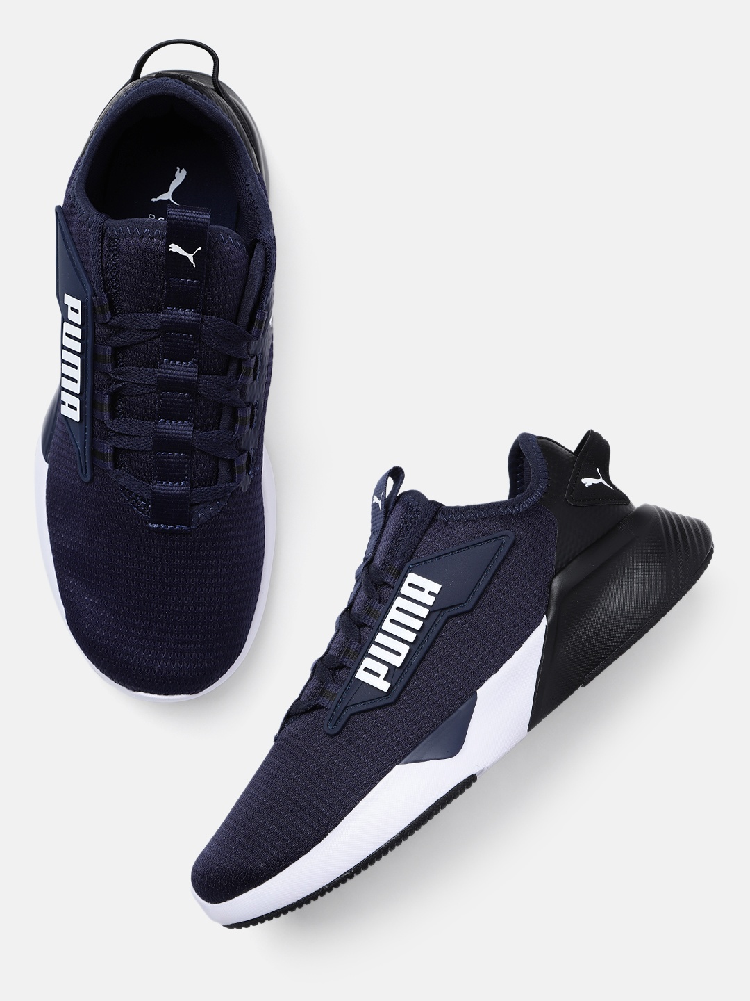 

Puma Unisex Textured Resolve Street Spark Road Running Shoes, Navy blue