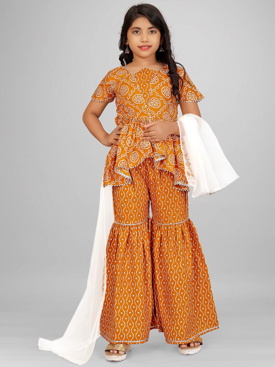

BAESD Girls Mustard Yellow Floral Printed Regular Kurta with Sharara & With Dupatta