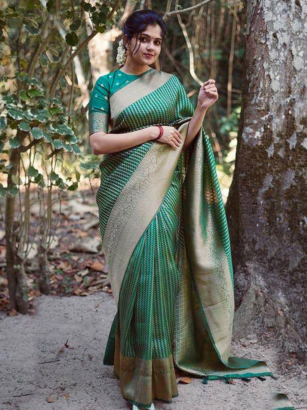 

Mitera Teal & Gold Toned Striped Zari Banarasi Saree