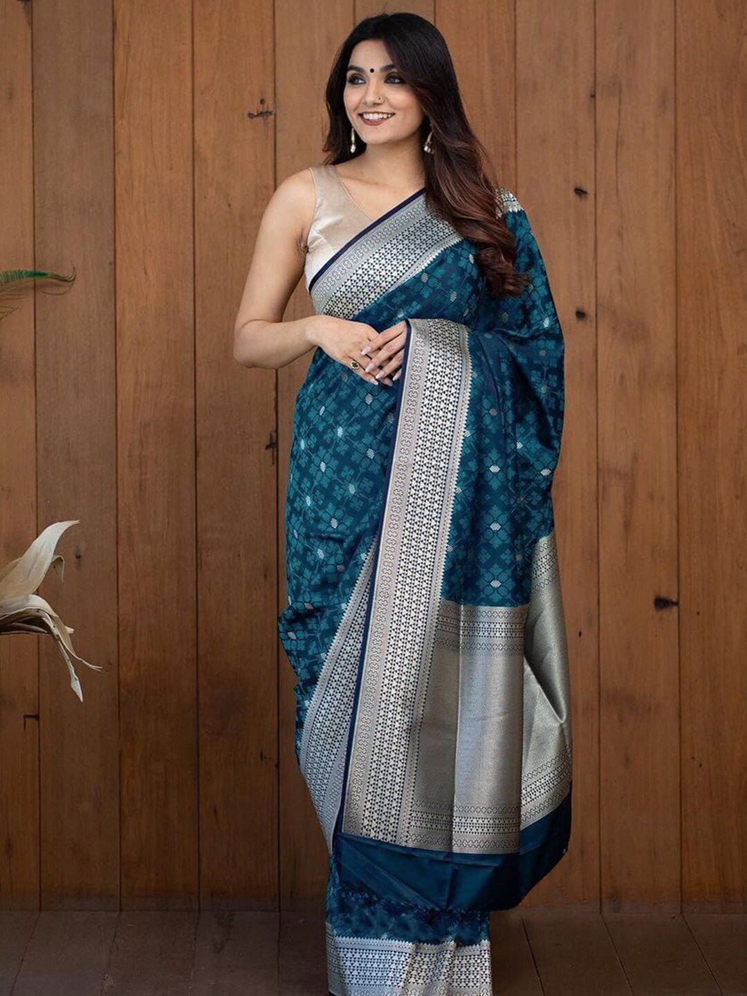 

Mitera Turquoise Blue & Silver Toned Ethnic Woven Design Zari Saree