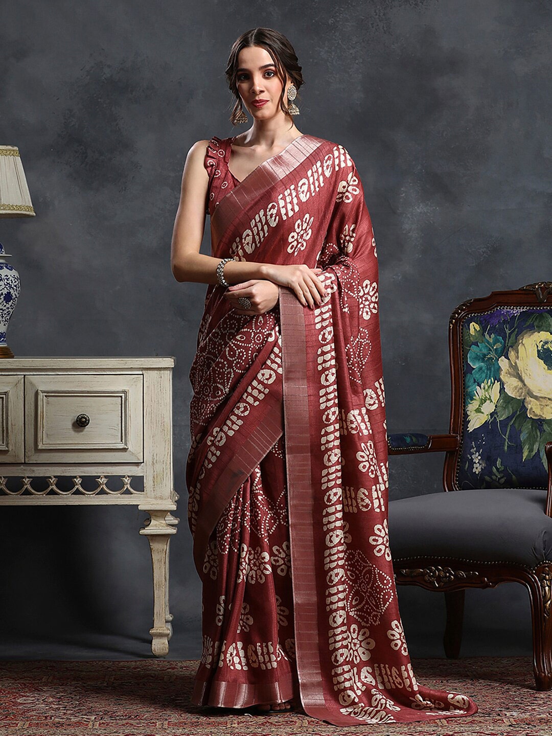 

Saree mall Rust & White Ethnic Motifs Printed Zari Sungudi Saree