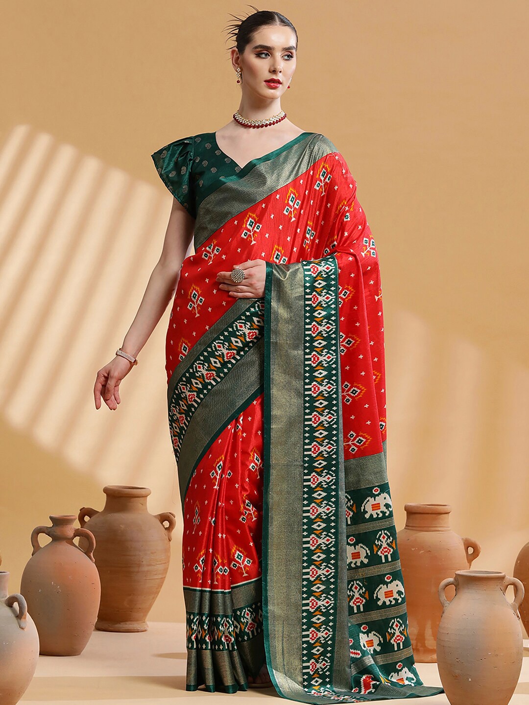 

Saree mall Red & Green Ethnic Motifs Printed Zari Ikat Saree