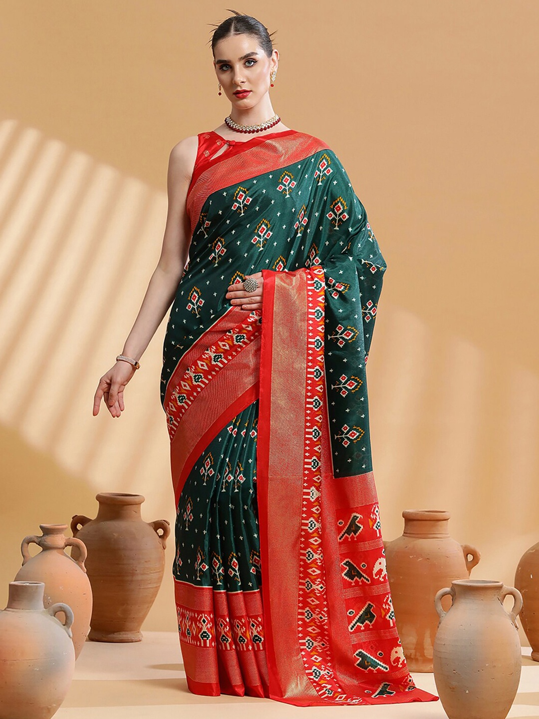 

Saree mall Green & Red Ethnic Motifs Printed Zari Ikat Saree