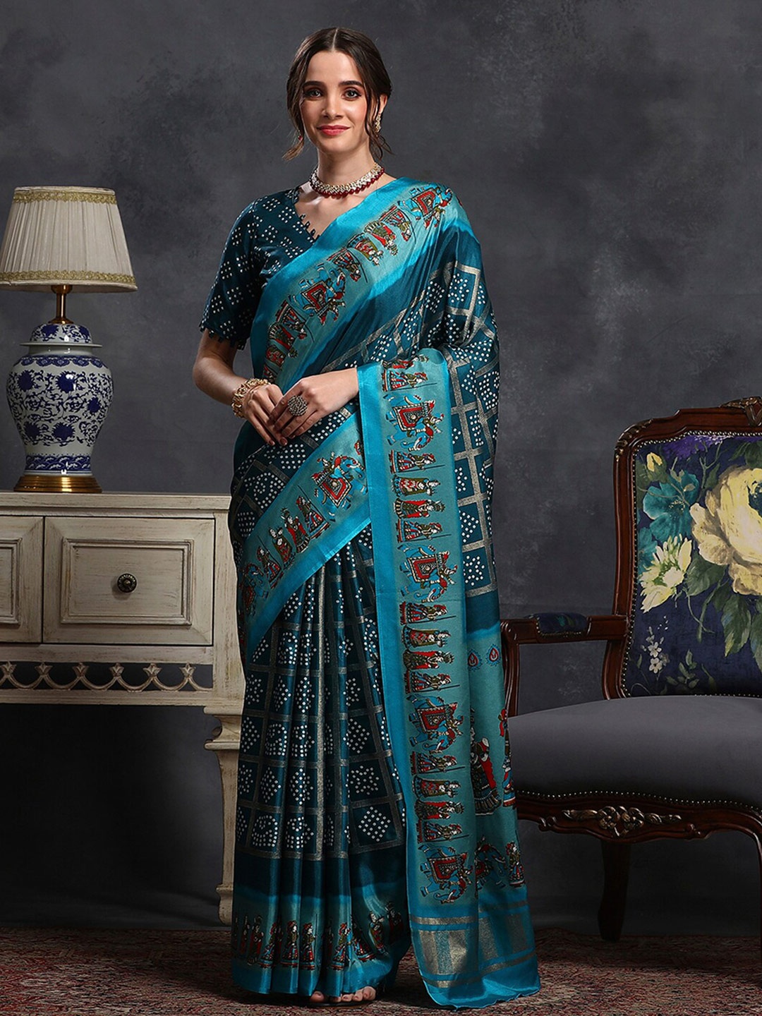 

Saree mall Teal & White Ethnic Motifs Printed Patola Saree