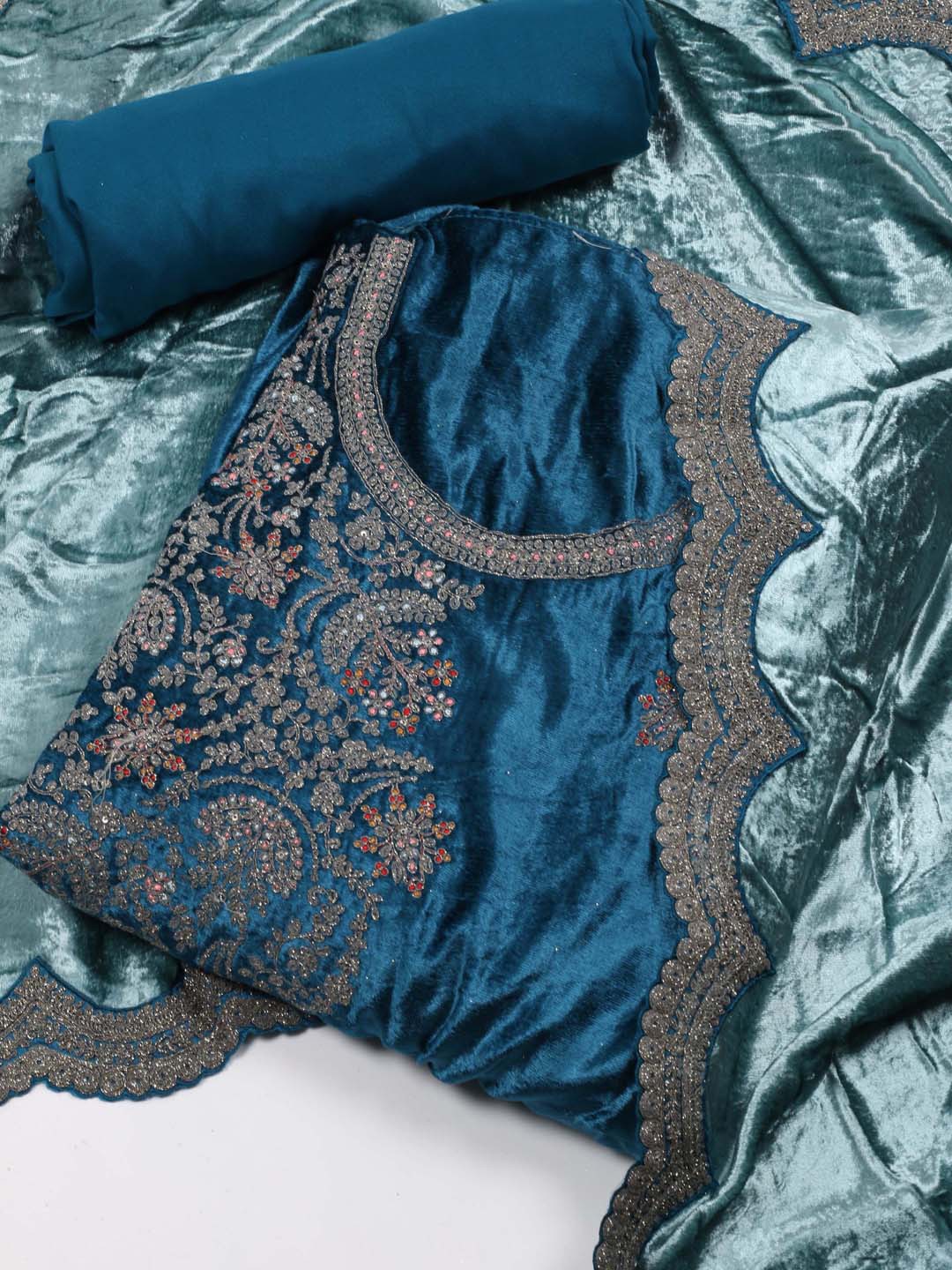 

Meena Bazaar Teal Embroidered Velvet Unstitched Dress Material