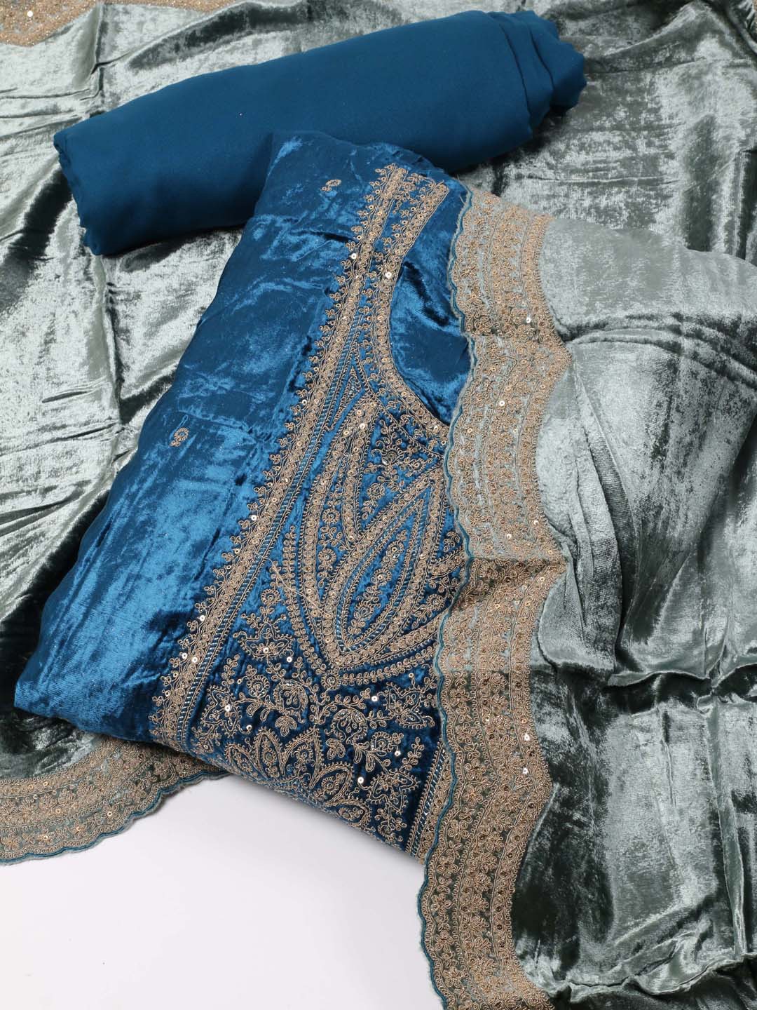 

Meena Bazaar Teal Embroidered Velvet Unstitched Dress Material