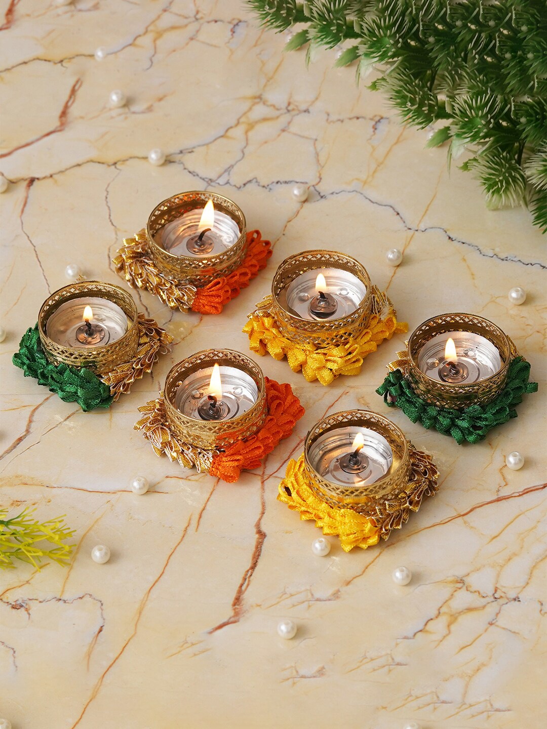 

eCraftIndia Gold Toned & Orange 6 Pieces Textured Round Shaped Metal Candle Holders