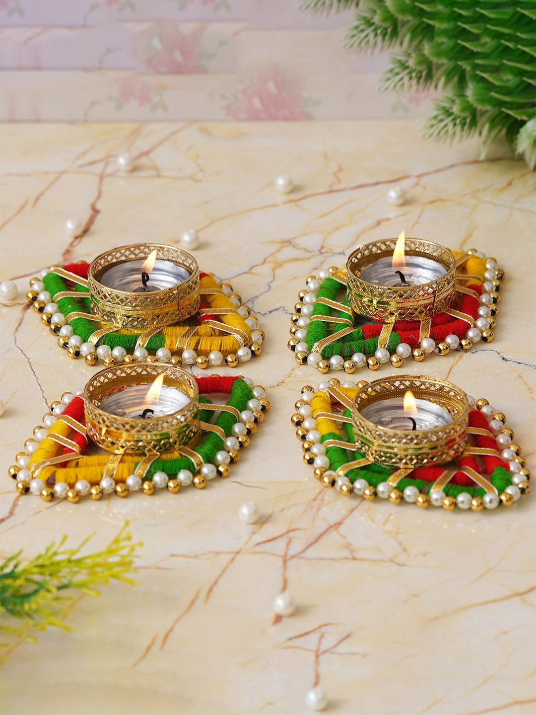 

eCraftIndia Gold Toned & Green 4 Pieces Textured Metal Candle Holders