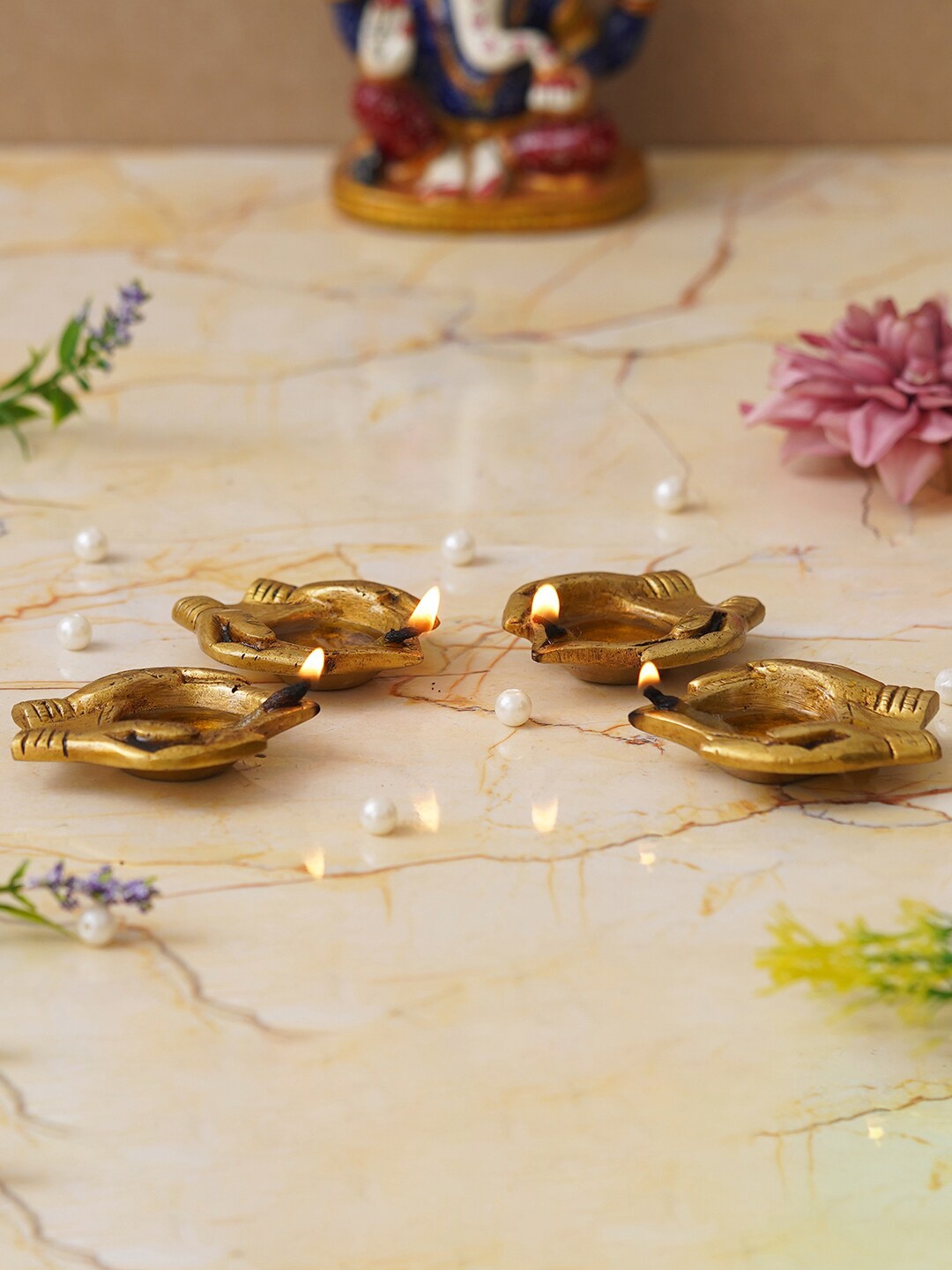 

eCraftIndia 4 Pieces Beige Lady Hand Holding Diyas