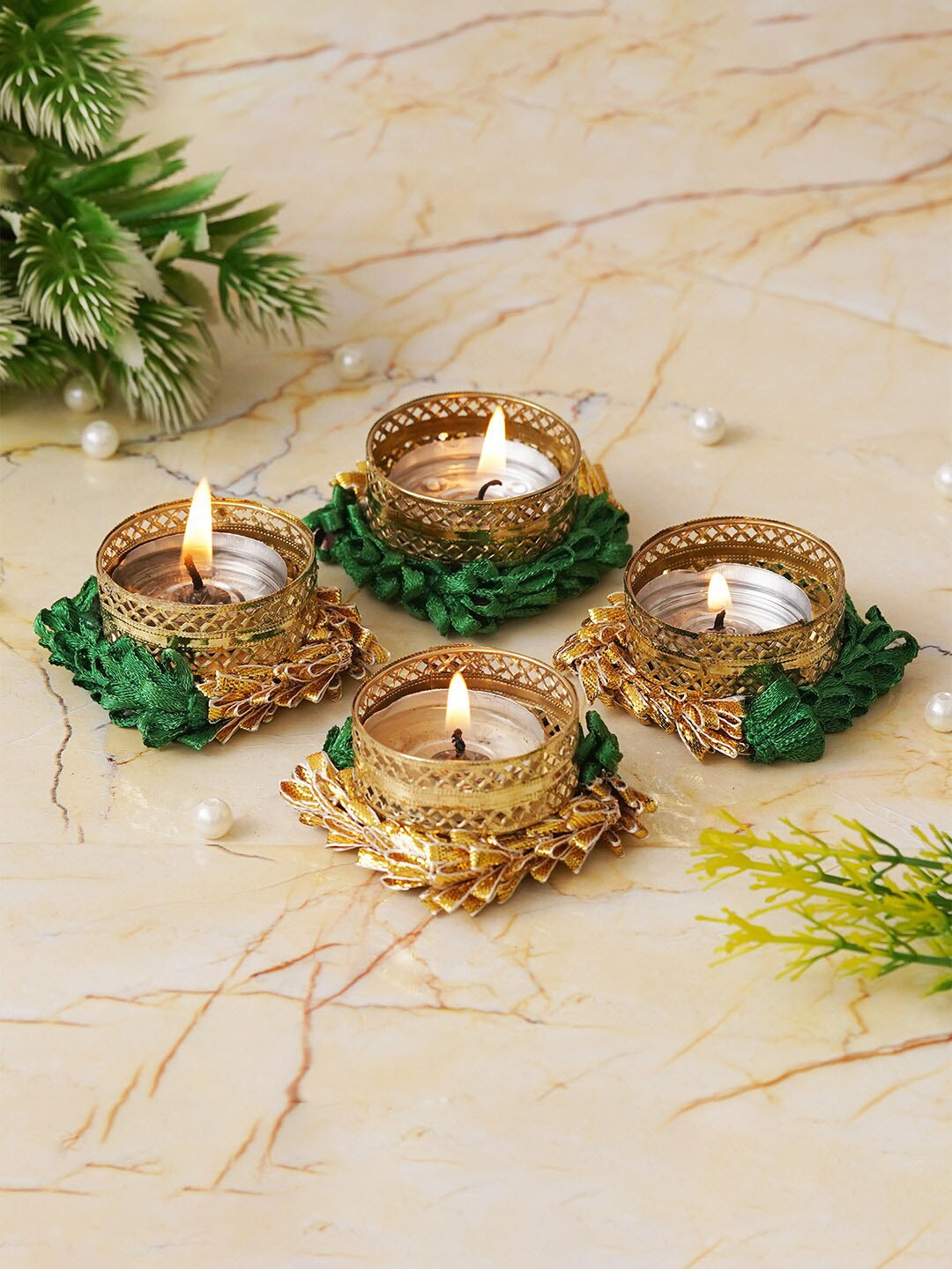 

eCraftIndia Green & Gold Toned 4 Pieces Textured Round Shaped Metal Candle Holders