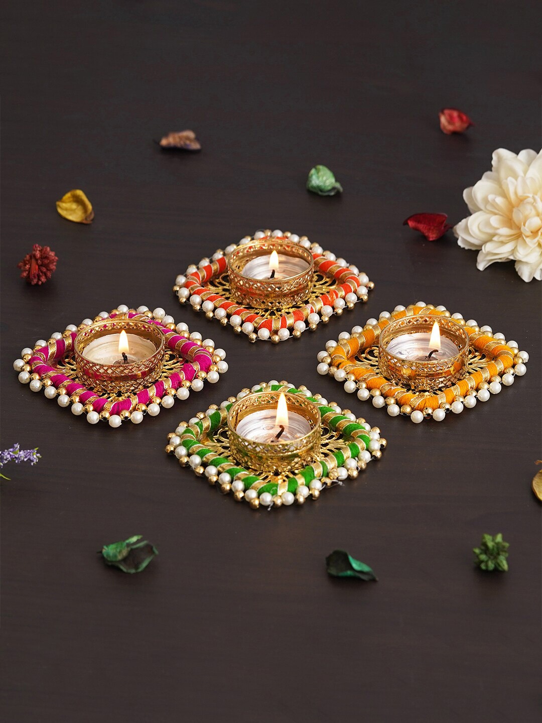 

eCraftIndia Gold Toned & White 4 Pcs Candle Holder