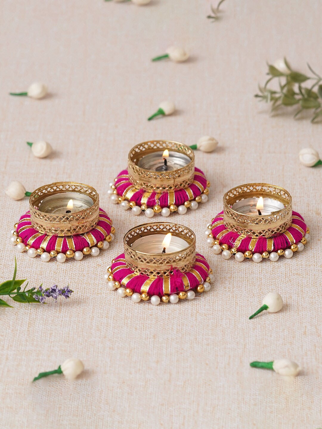 

eCraftIndia Pink & Gold Toned 4 Pcs Candle Holder