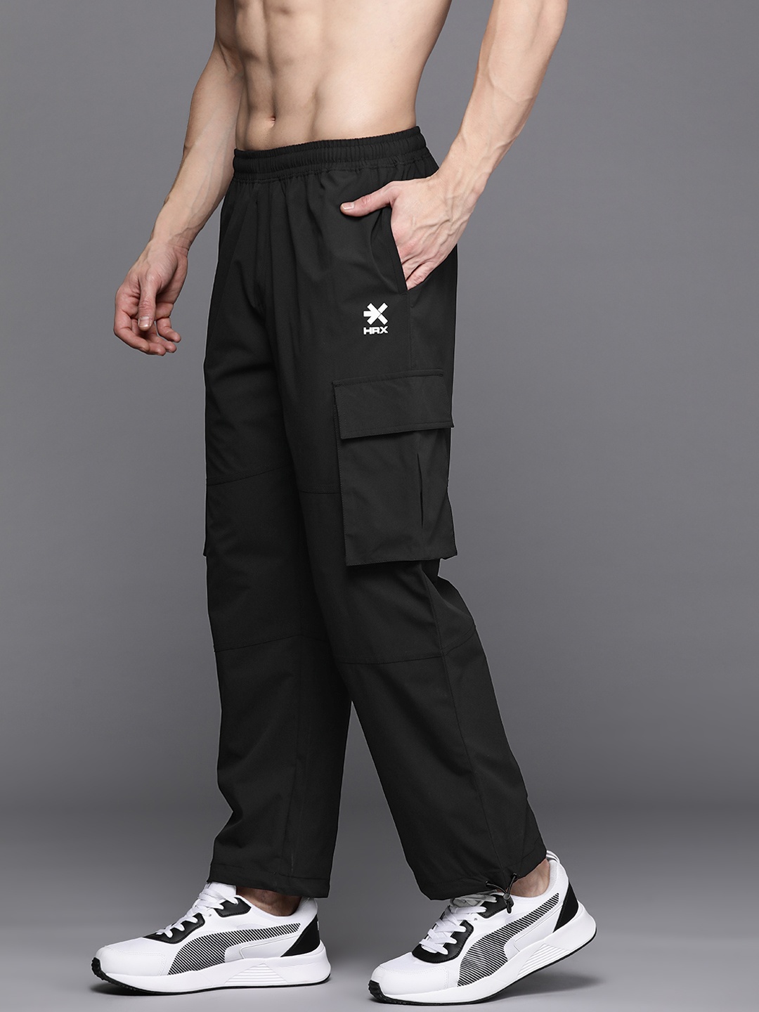 

HRX by Hrithik Roshan x Fighter Men Relaxed Fit Parachute Track Pants, Black