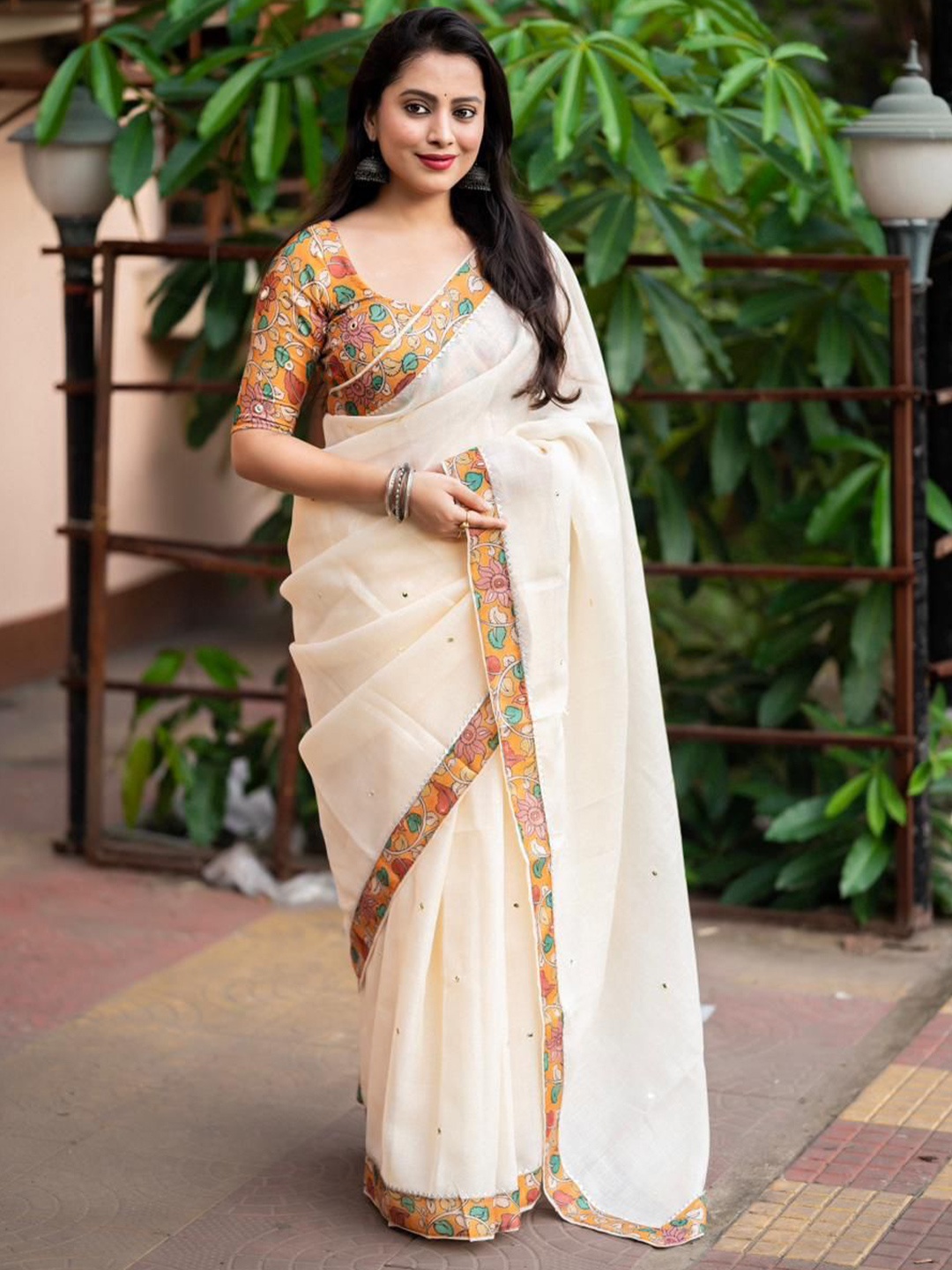 

STAVA CREATION Floral Print Mirror Work Pure Linen Saree, Yellow