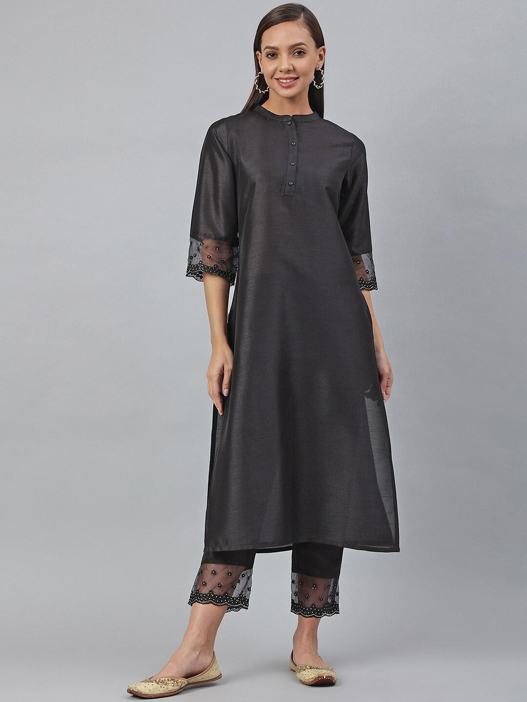 

Janasya Women's Black Poly Silk Solid Kurta with Pant