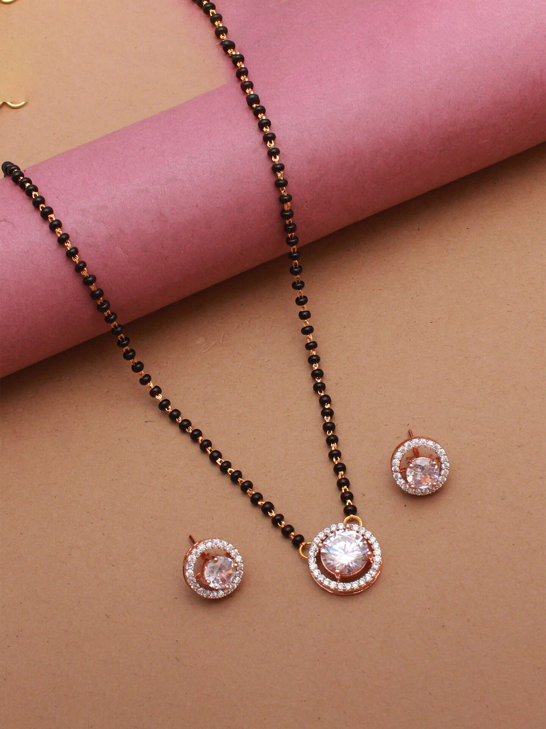

Mirana Gold-Plated CZ-Stone studded Circular Shaped Mangalsutra With Earrings
