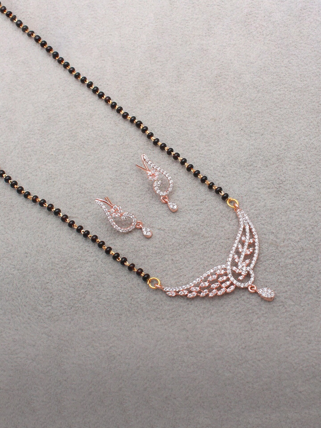 

Mirana Rose Gold-Plated CZ-Stone Studded Peacock Shaped Mangalsutra With Earrings
