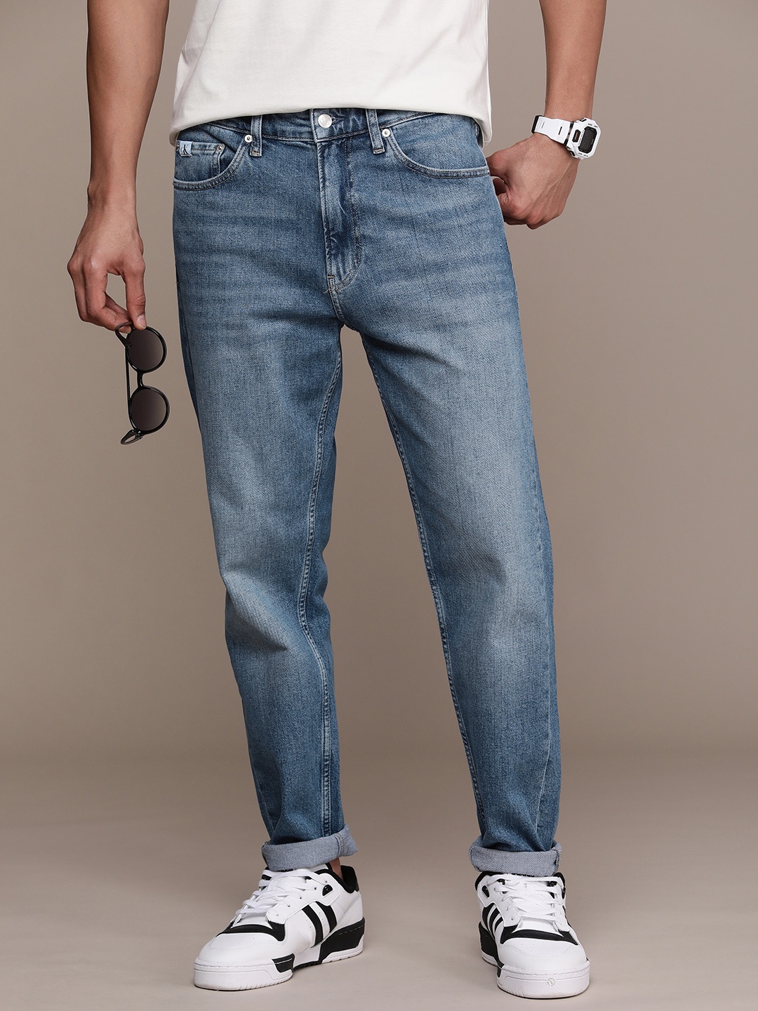 

Calvin Klein Jeans Men Pure Cotton Regular Tapered Fit Jeans, Blue