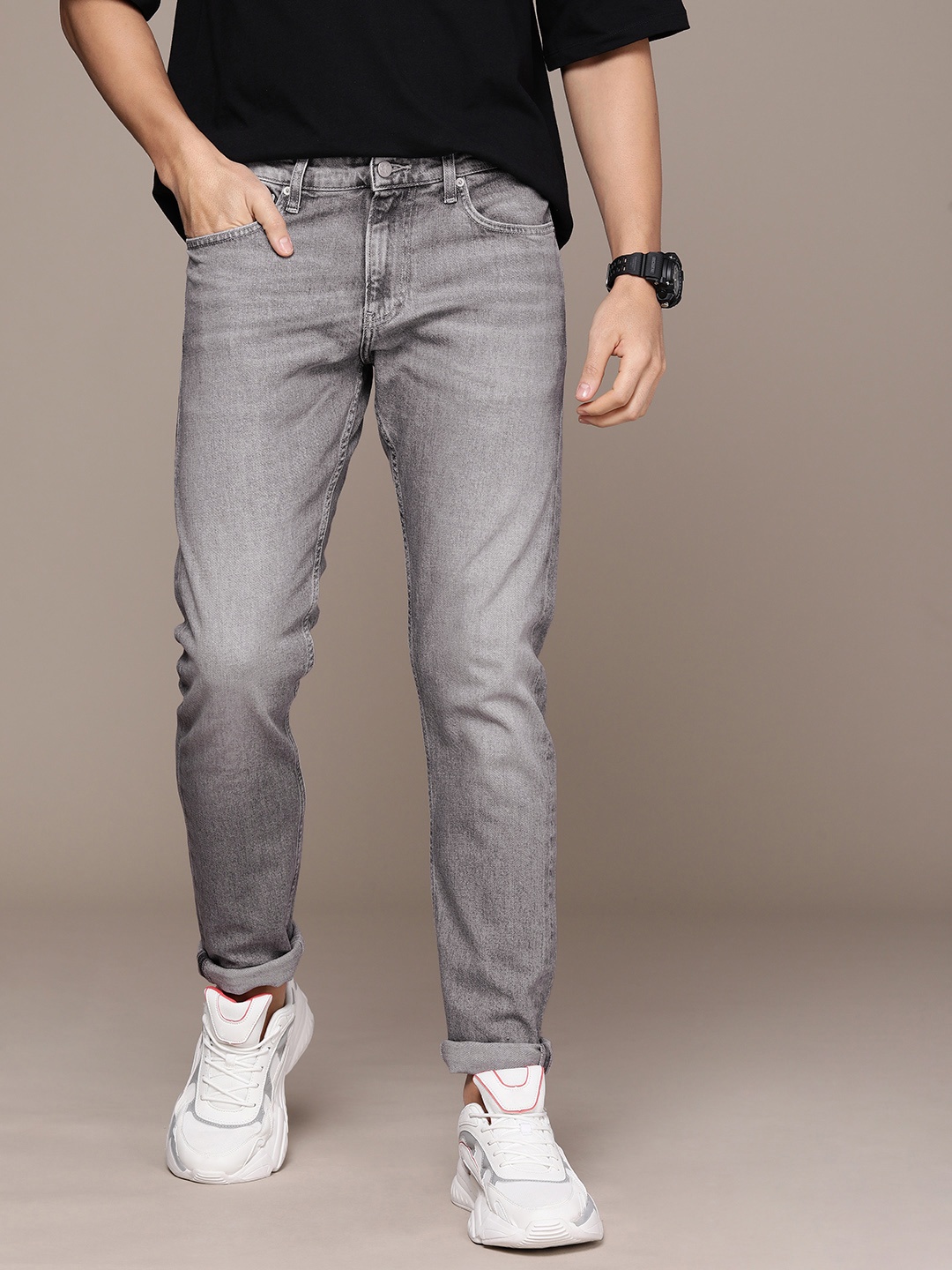 

Calvin Klein Jeans Men Slim Fit Heavy Fade Jeans, Grey