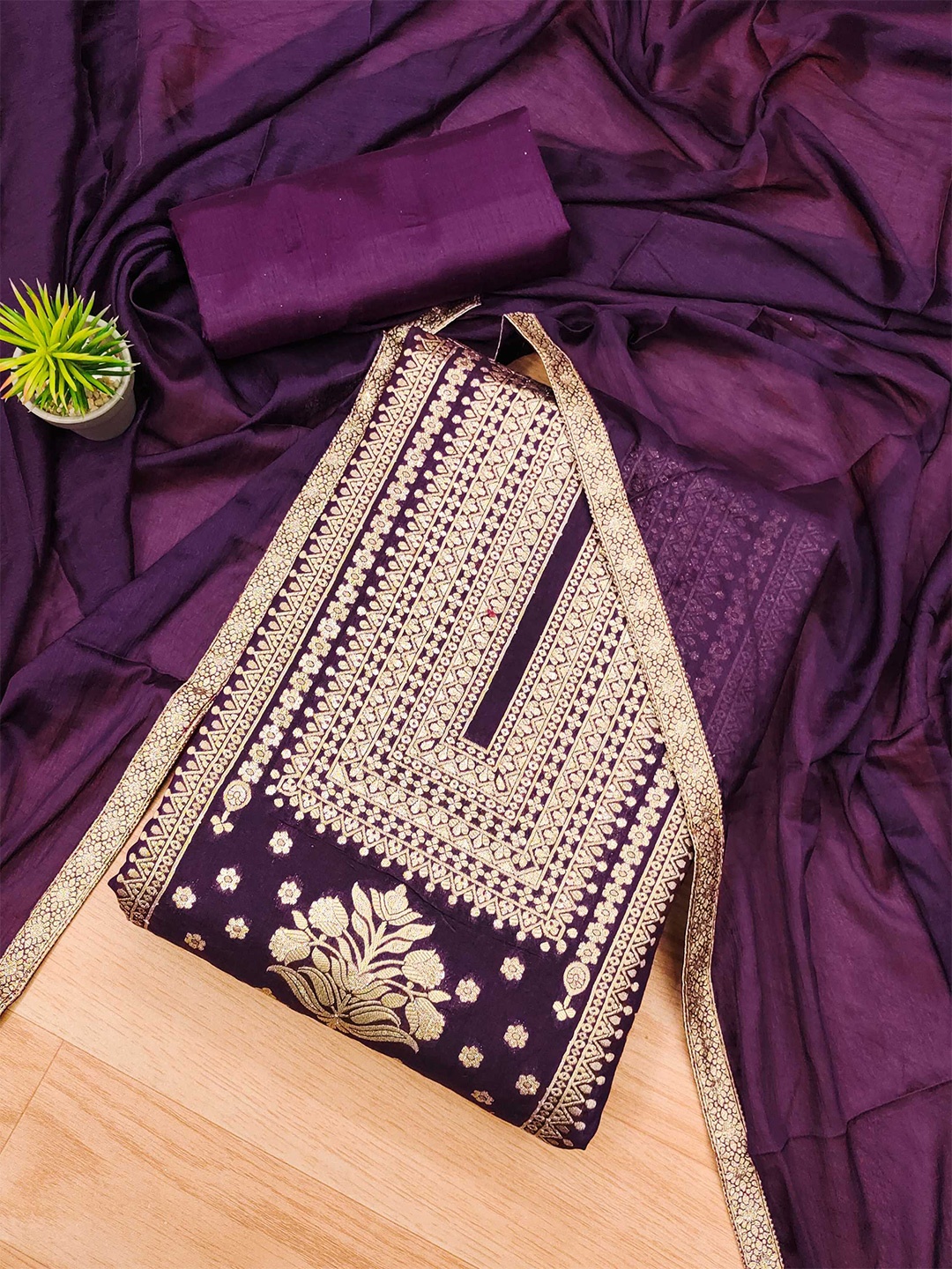 

Panzora Purple Unstitched Dress Material