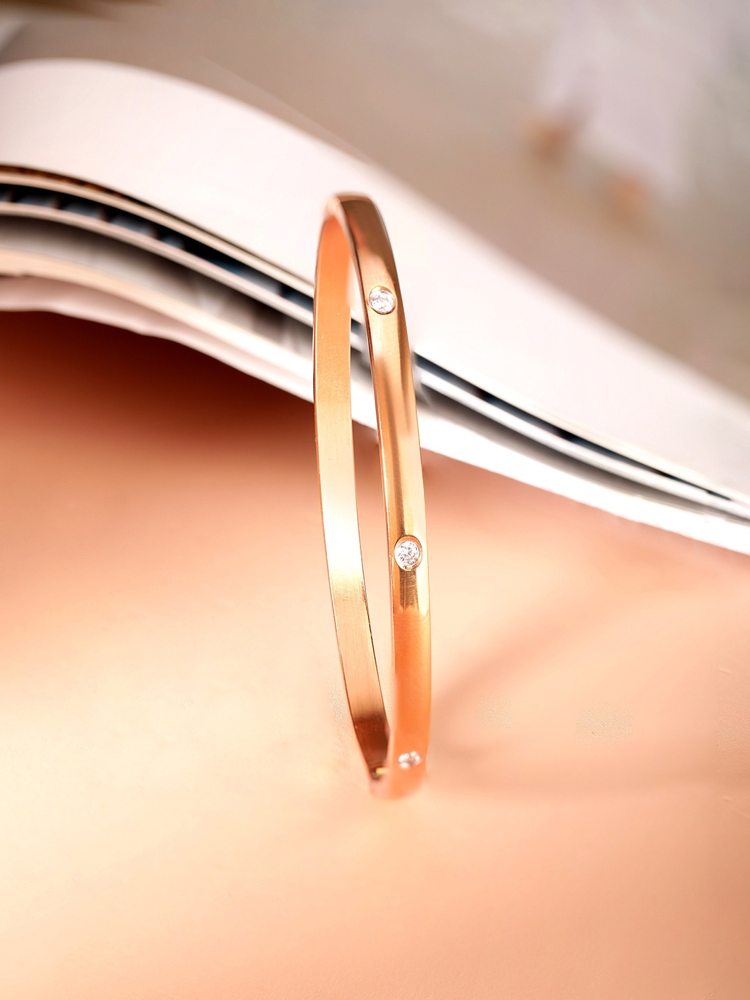 

Rubans Voguish Rose Gold-Plated Cubic Zirconia Bangle-Style Bracelet