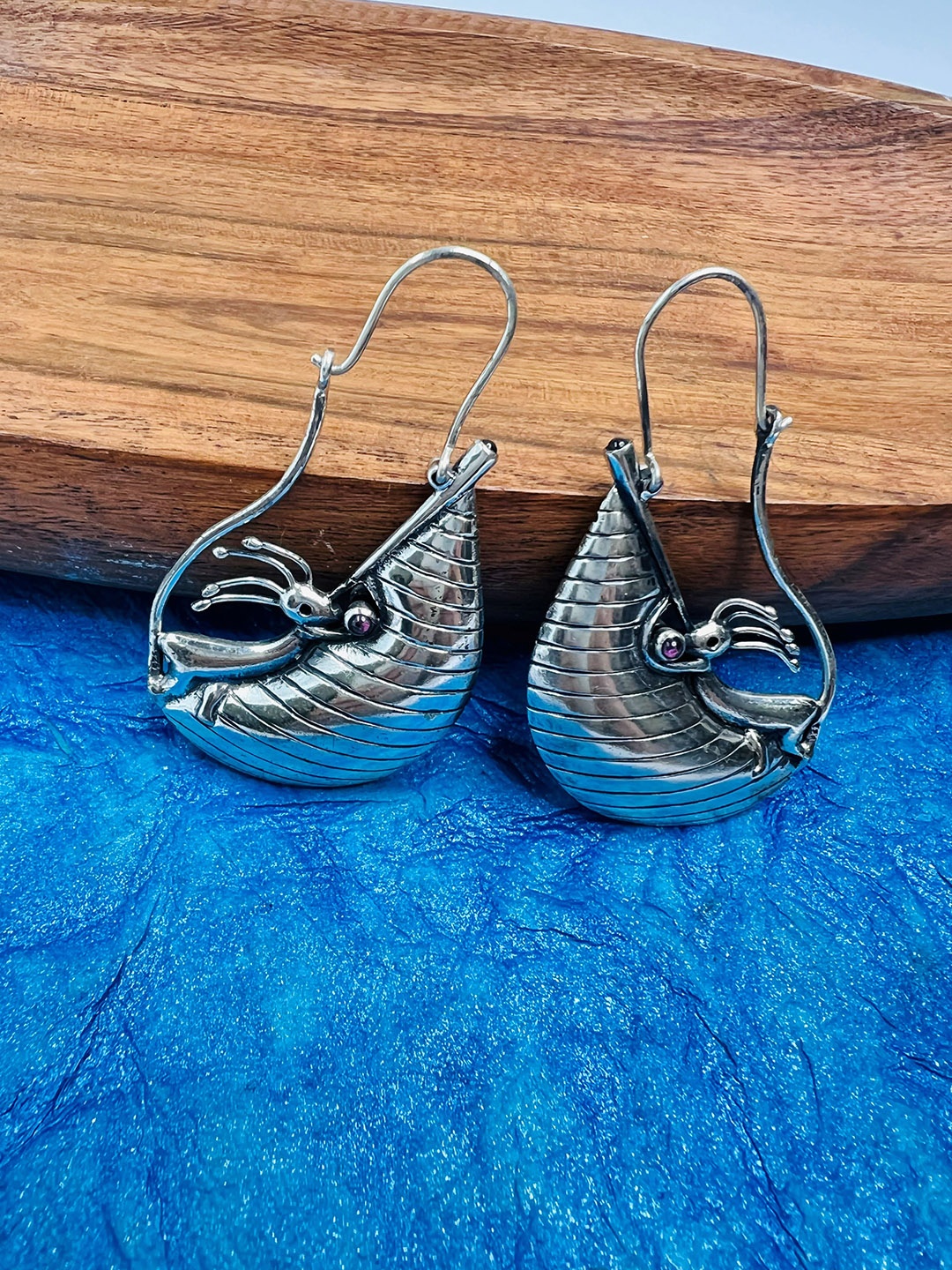 

Arte Jewels Silver-Toned Quirky Hoop Earrings
