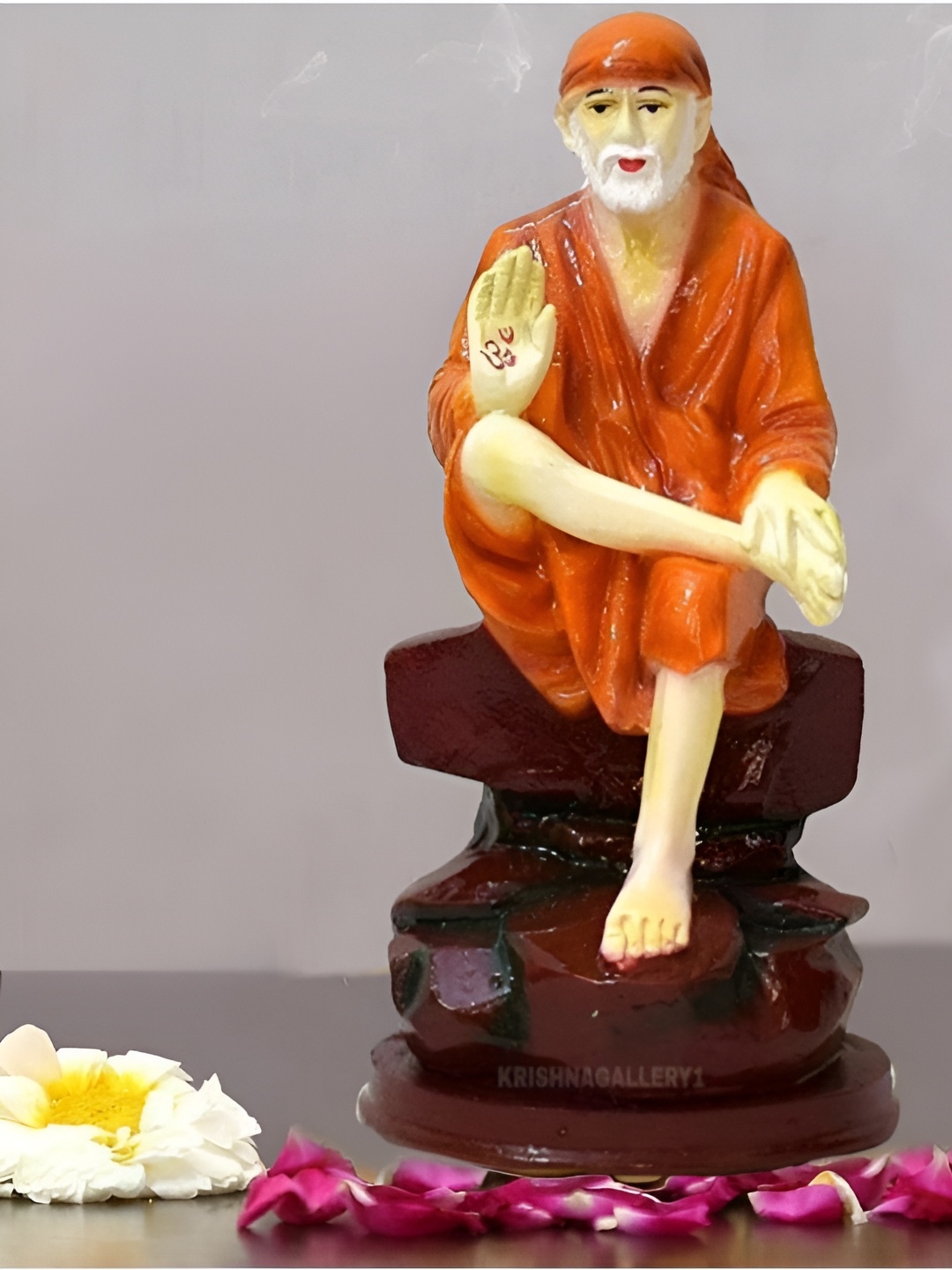 

krishnagallery1 Orange Marble Sai Baba Showpiece