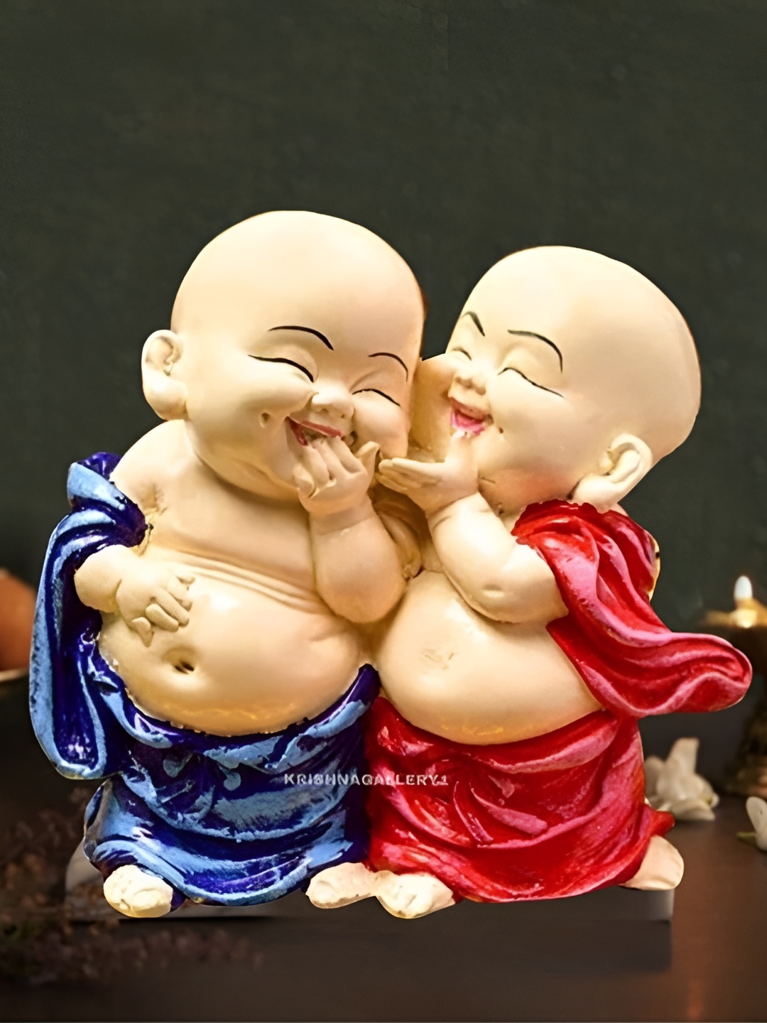 

krishnagallery1Blue and Red Religious Idols of Baby Monks Showpiece, Blue