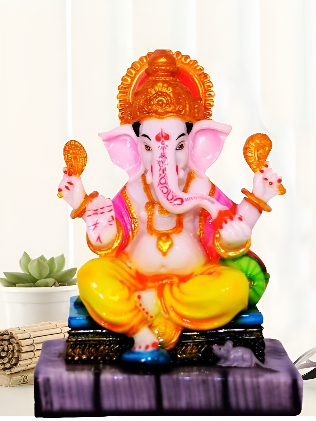 

krishnagallery1GoldToned and Pink Marble Ganesh Murti Showpiece, Gold