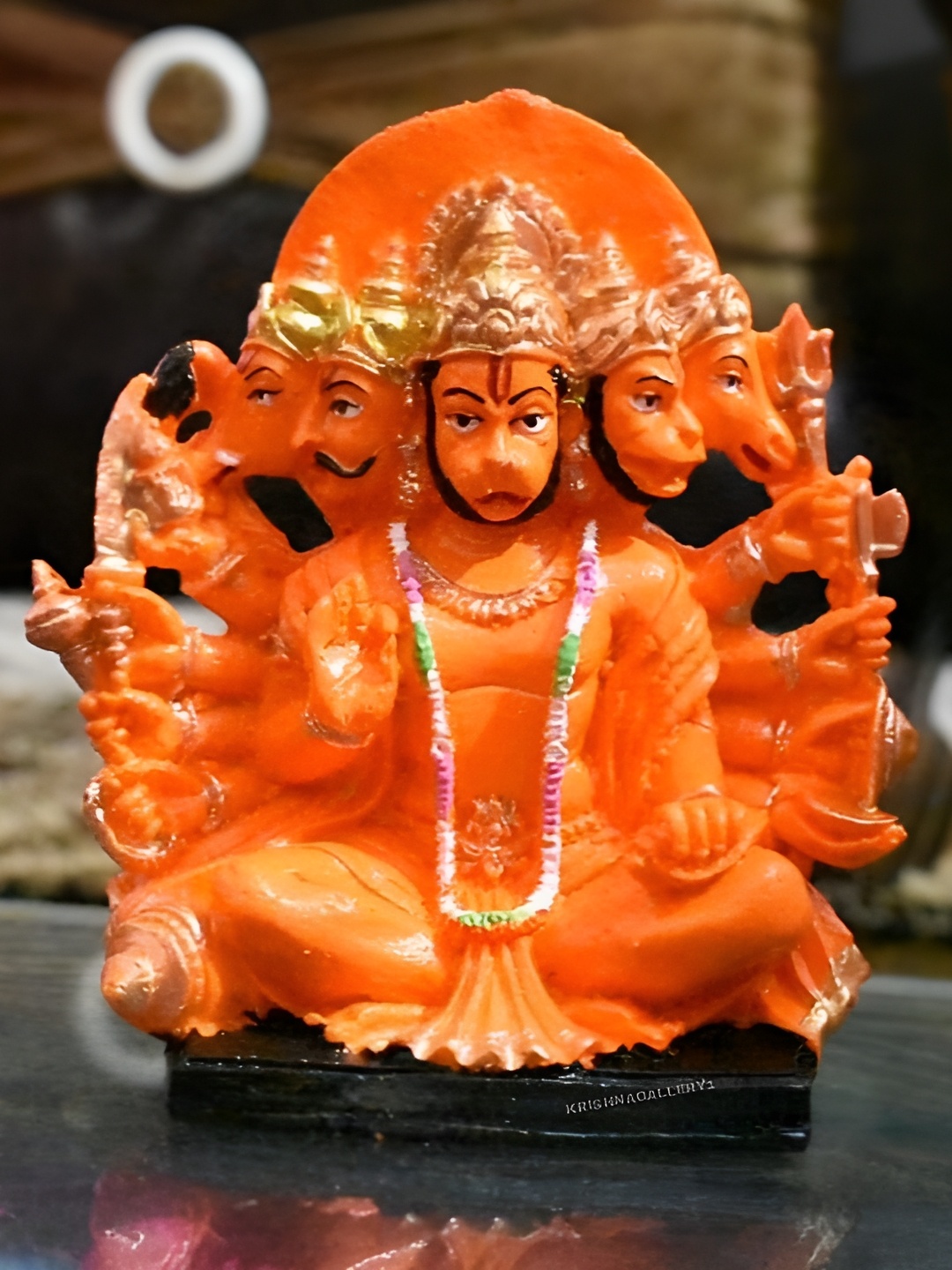 

krishnagallery1 Orange Marble Panchmukhi Hanuman Ji Showpiece