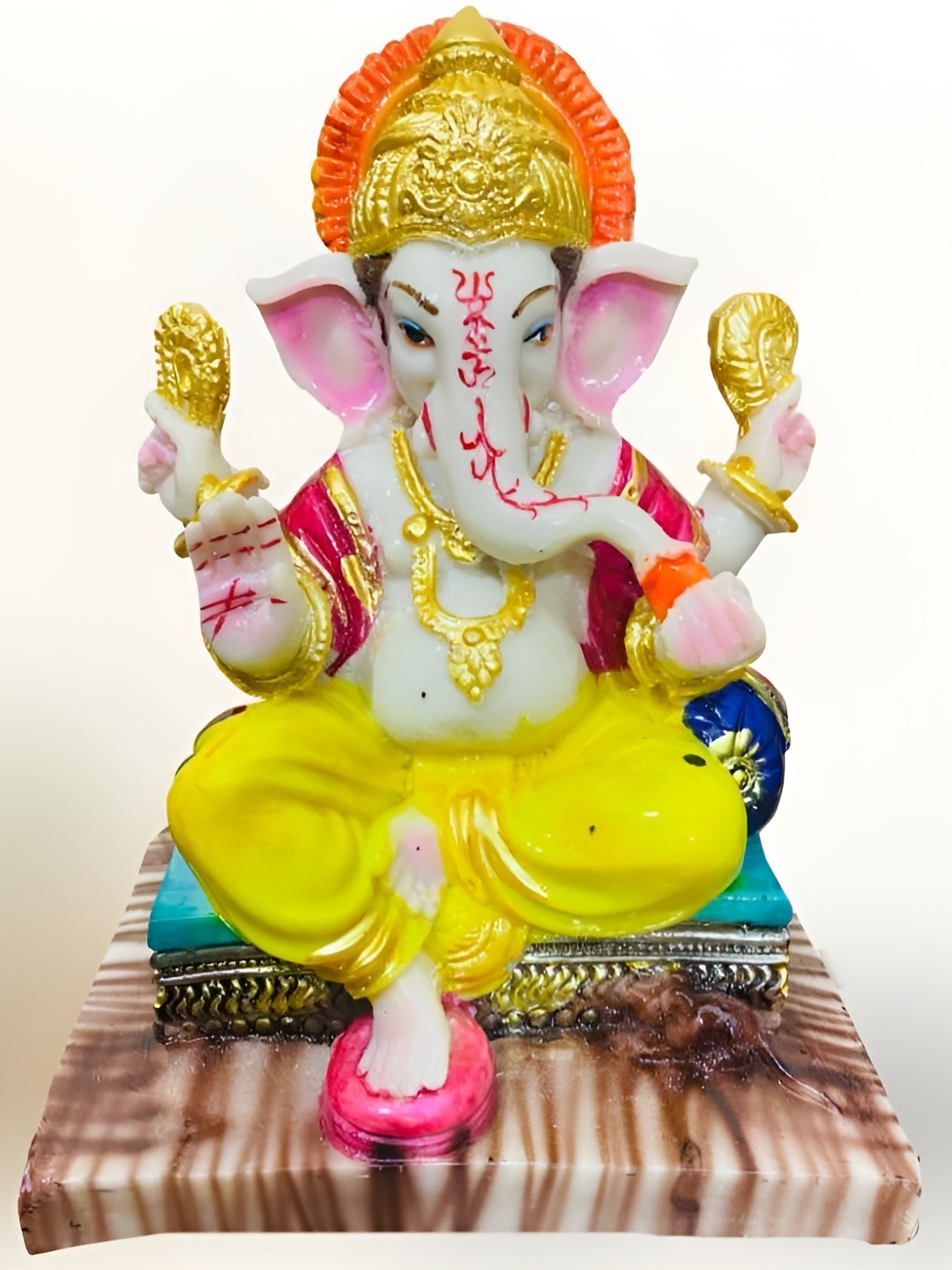 

krishnagallery1 Yellow Marble Ganesh Showpiece
