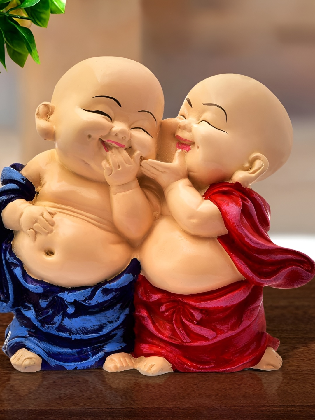 

krishnagallery1 Blue and Beige Religious Idols of Baby Monks Decorative Showpiece