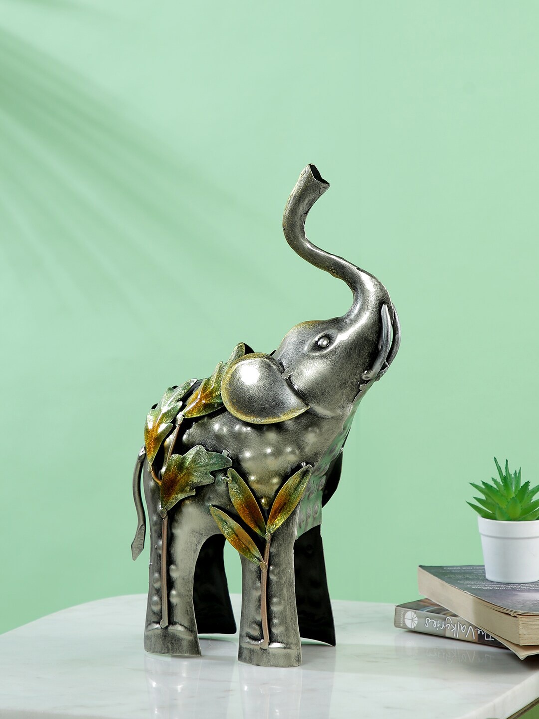 

CraftVatika Green & Mustard Small Figurine Metal Trunk Up Elephant Decorative Showpieces