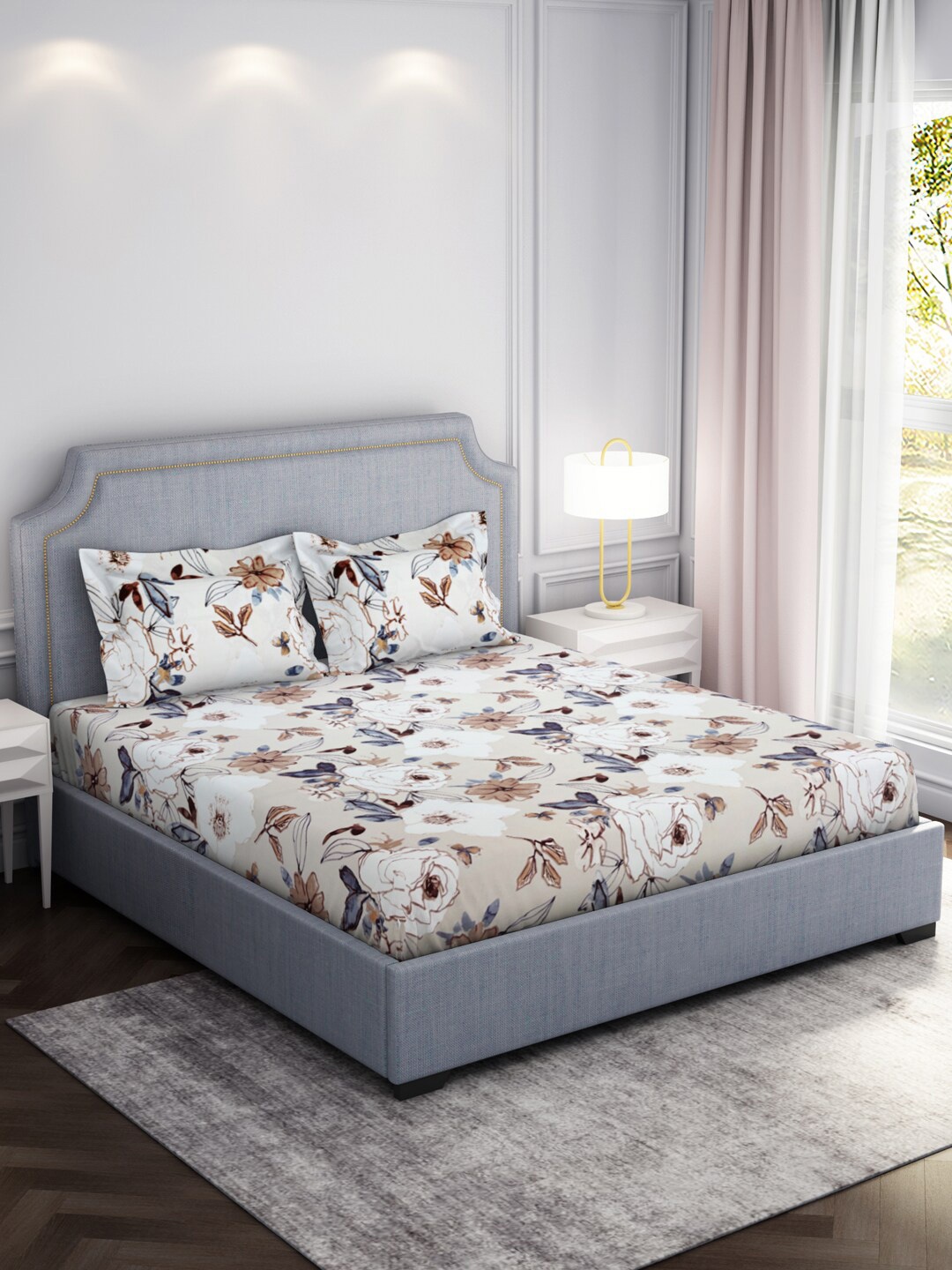 

Welspun Brown & White Floral Printed Cotton 130 TC King Bedsheet With 2 Pillow Covers