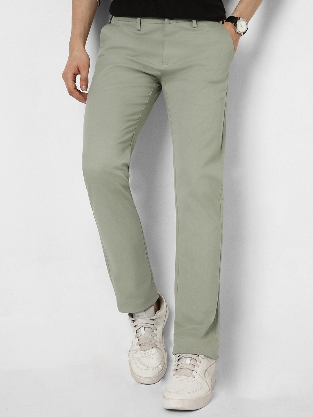 

Peter England CasualsMen Slim fit stretch chinos trousers, Green