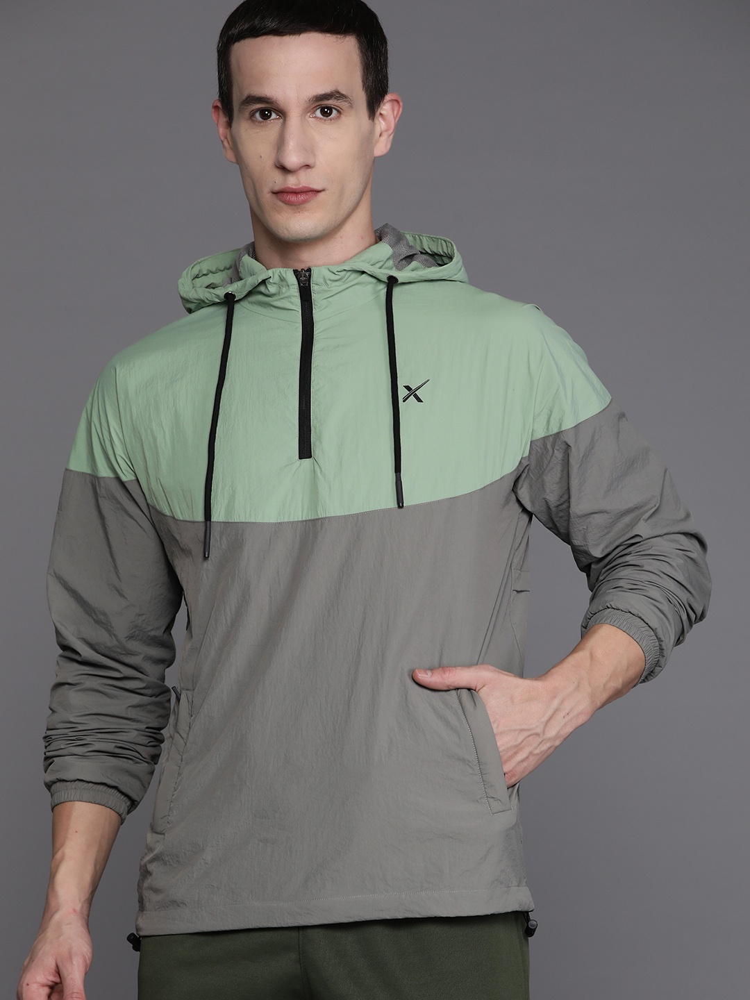 

HRX by Hrithik Roshan Men Colourblocked Windcheater Running Sporty Jacket, Sea green