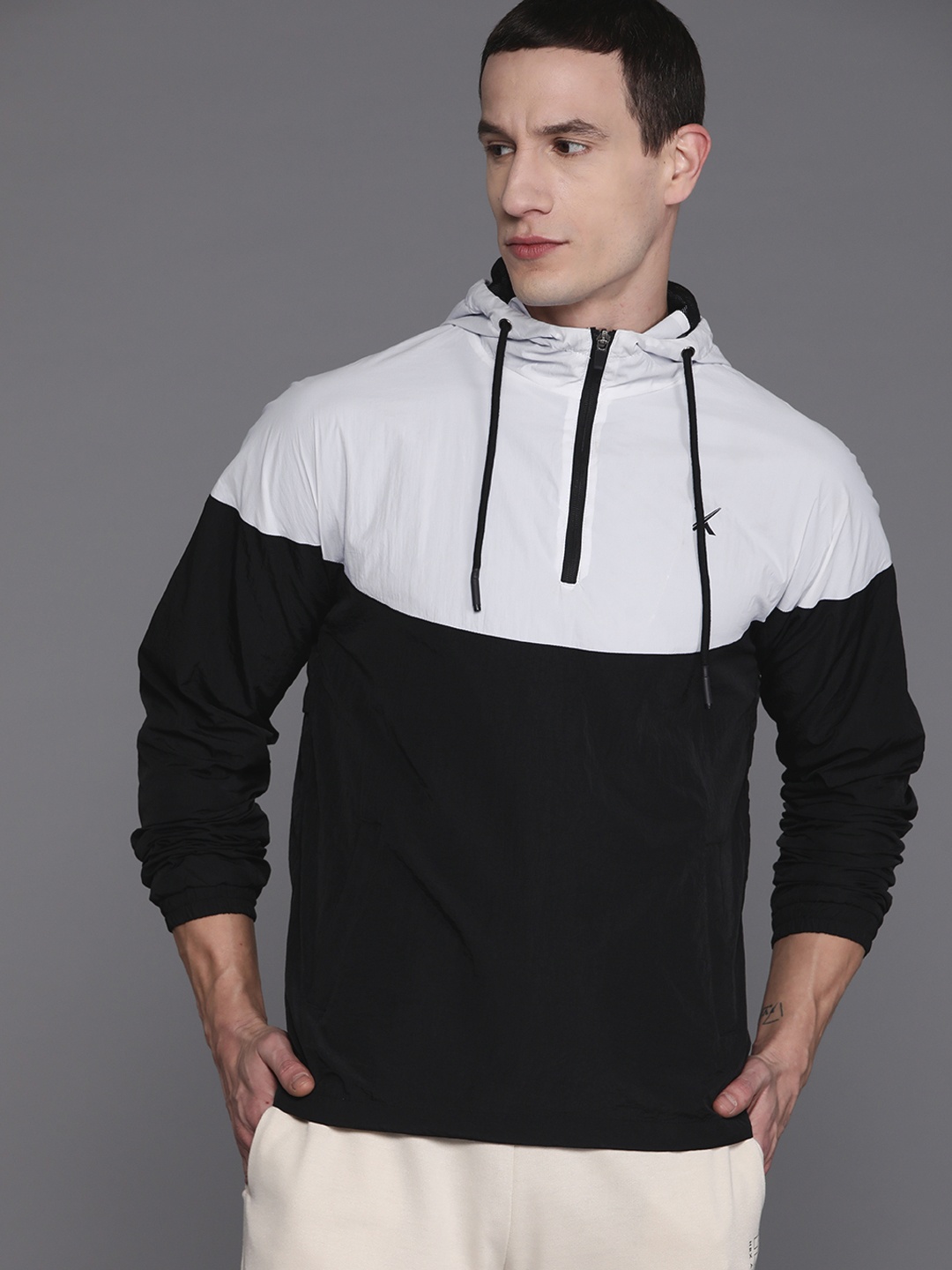 

HRX by Hrithik Roshan Men Colourblocked Windcheater Running Sporty Jacket, Black