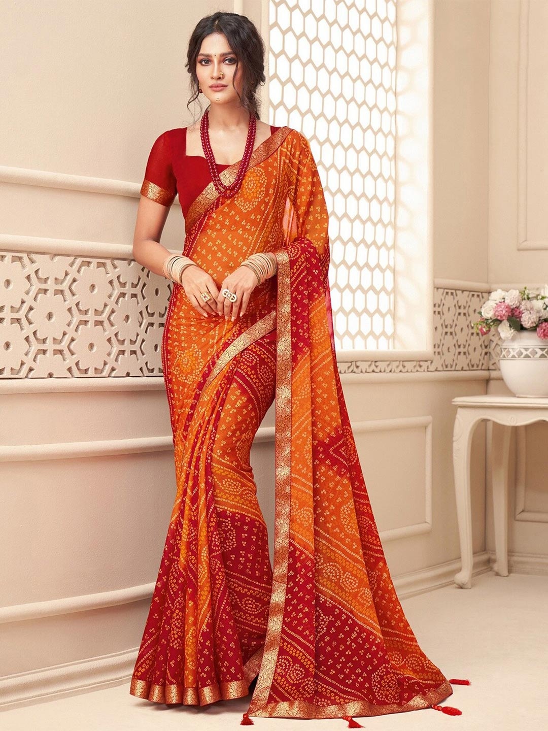 

RadadiyaTRD Bandhani Printed Zari Pure Georgette Bandhani Saree, Red