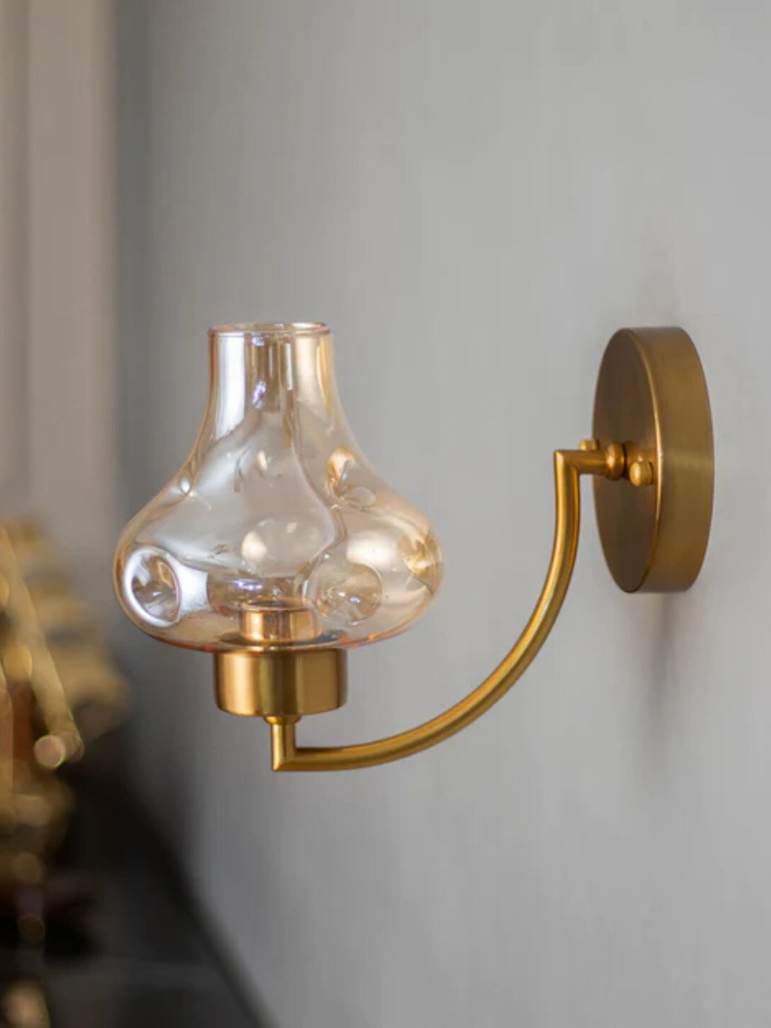 

THEDECORKART Gold Toned Textured Abstract Shaped Metal Wall Lamp