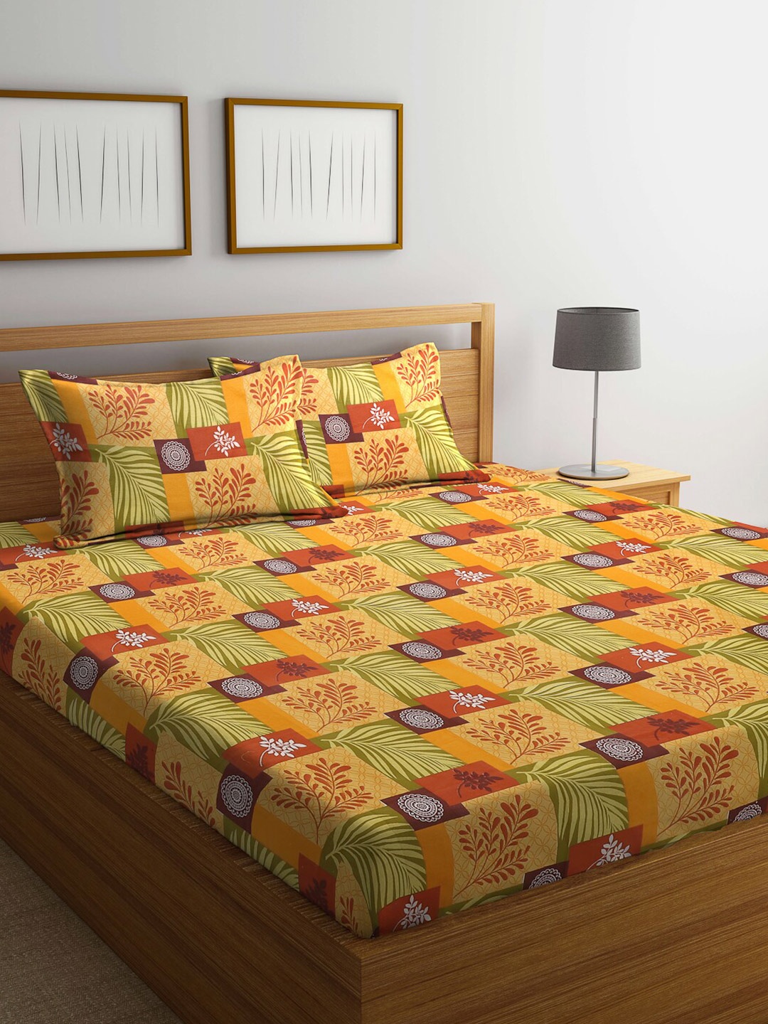 

Dhrohar Yellow & Red Printed Cotton 240 TC Queen Bedsheet with 2 Pillow Covers