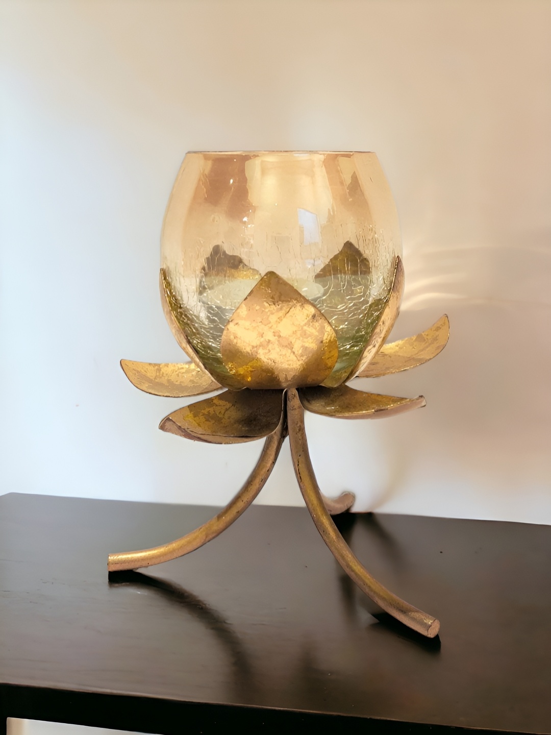 

The Artage Gold-Toned Lotus Tea Light Holder Showpiece