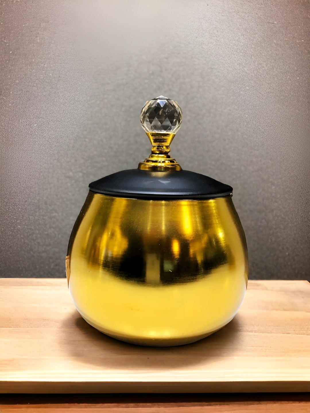 

The Artage Gold-Toned Black Metal Jar With Lid Showpiece