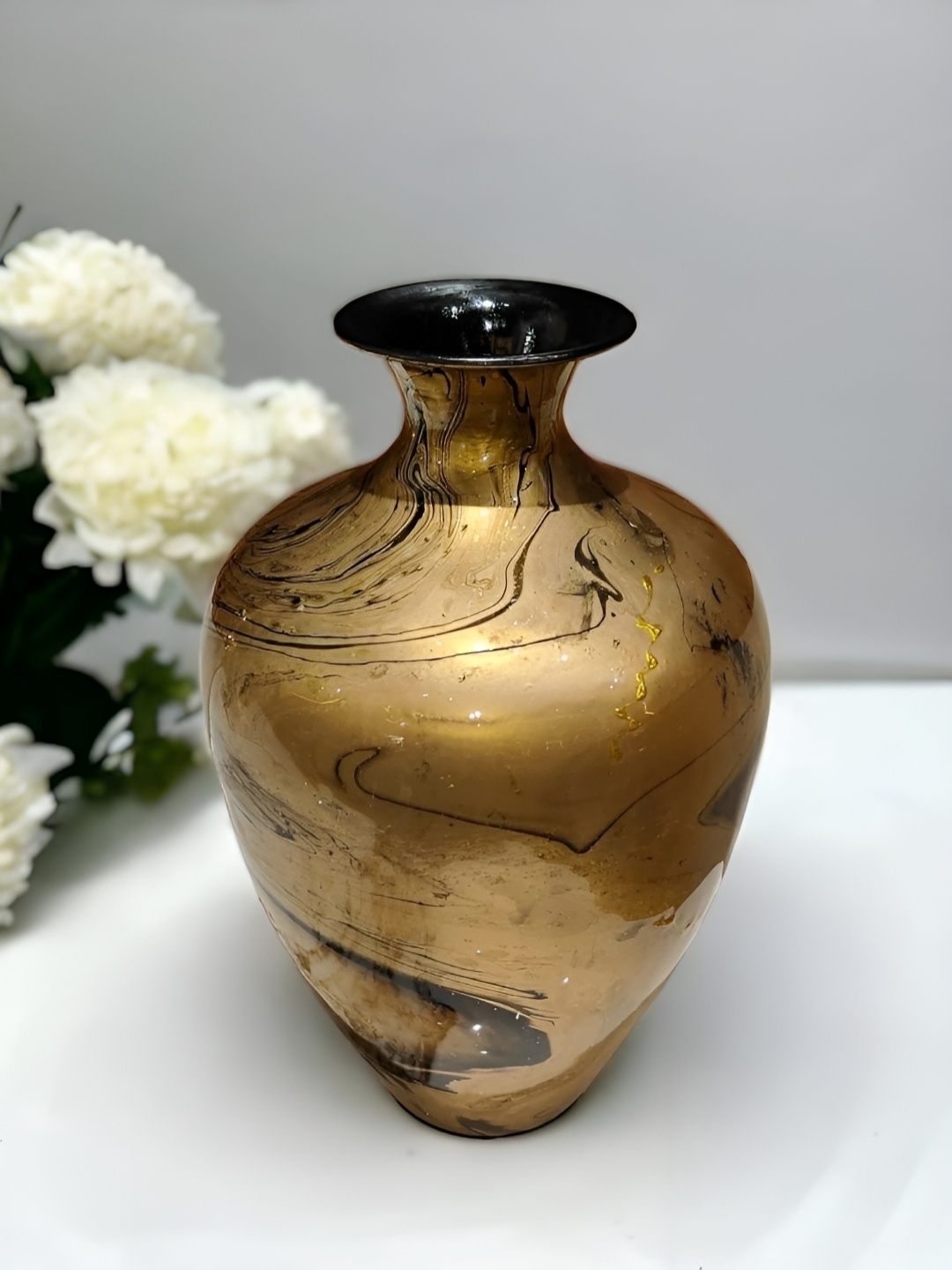 

The Artage Beige Marble Finish Oval Shape Metal Vase