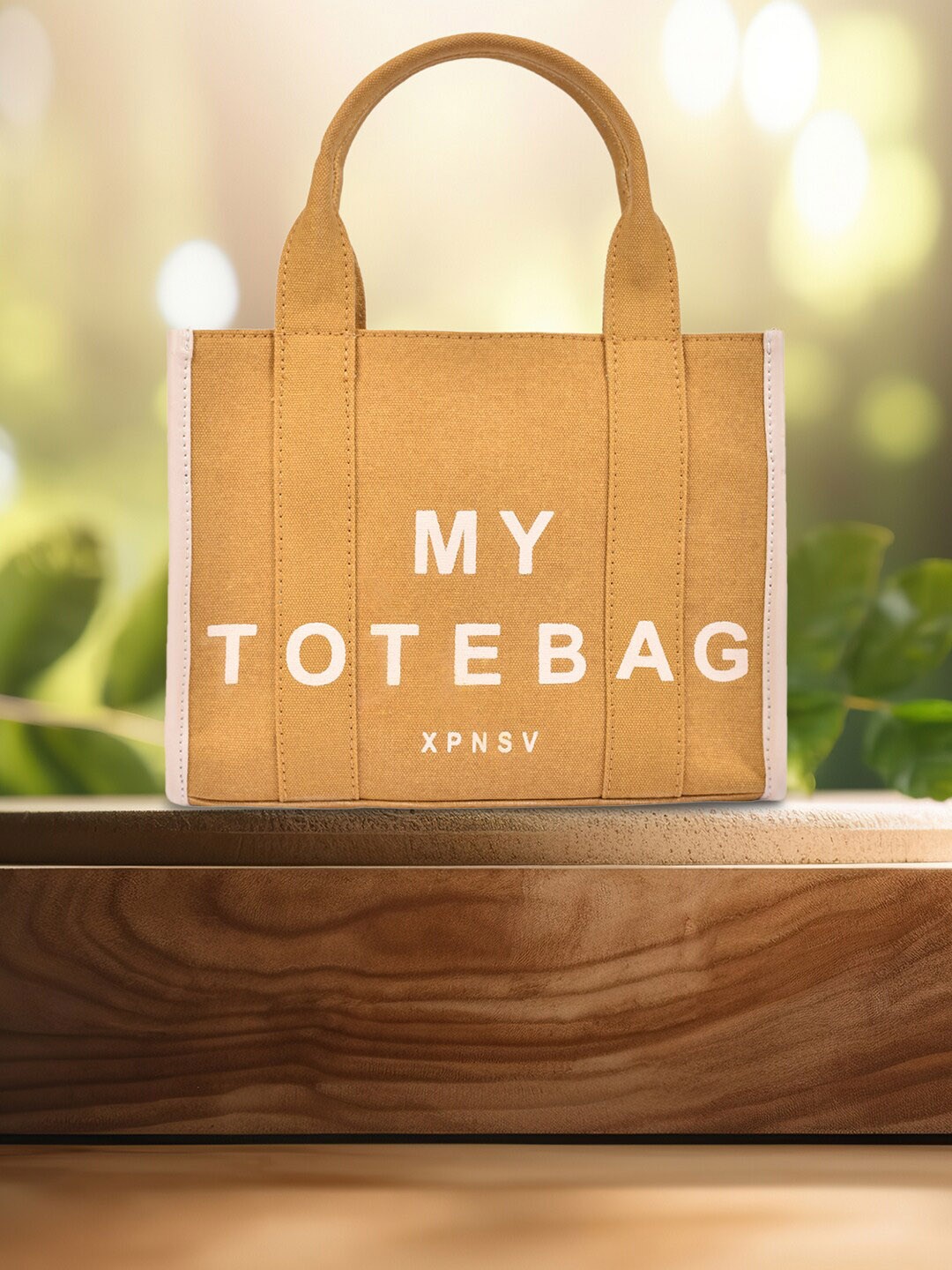 

XPNSV Typography Printed Structured Canvas Handheld Bag, Yellow