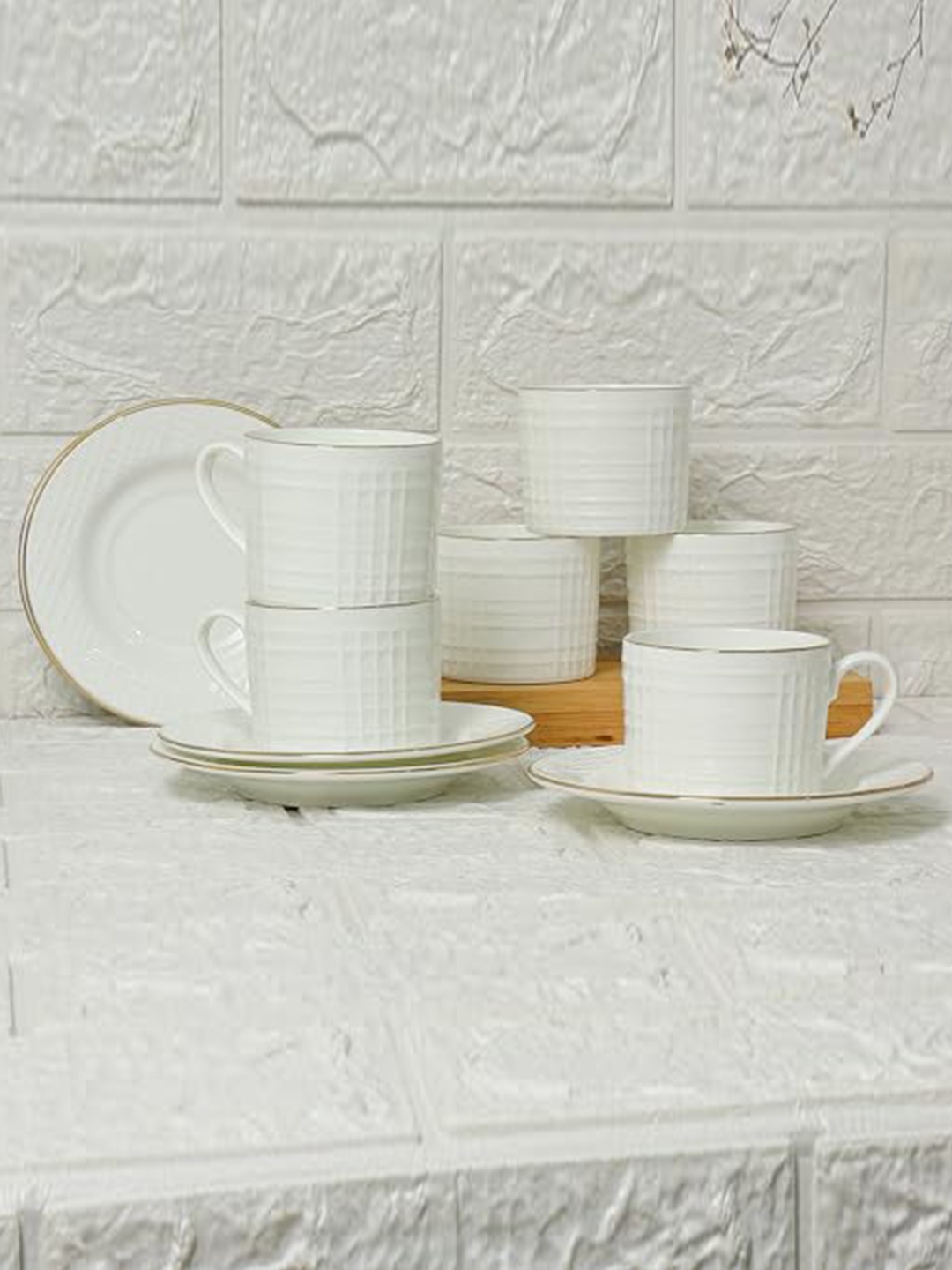 

Femora White & Gold Toned 12 Pcs Solid Ceramic Glossy Cups and Saucers 200ml
