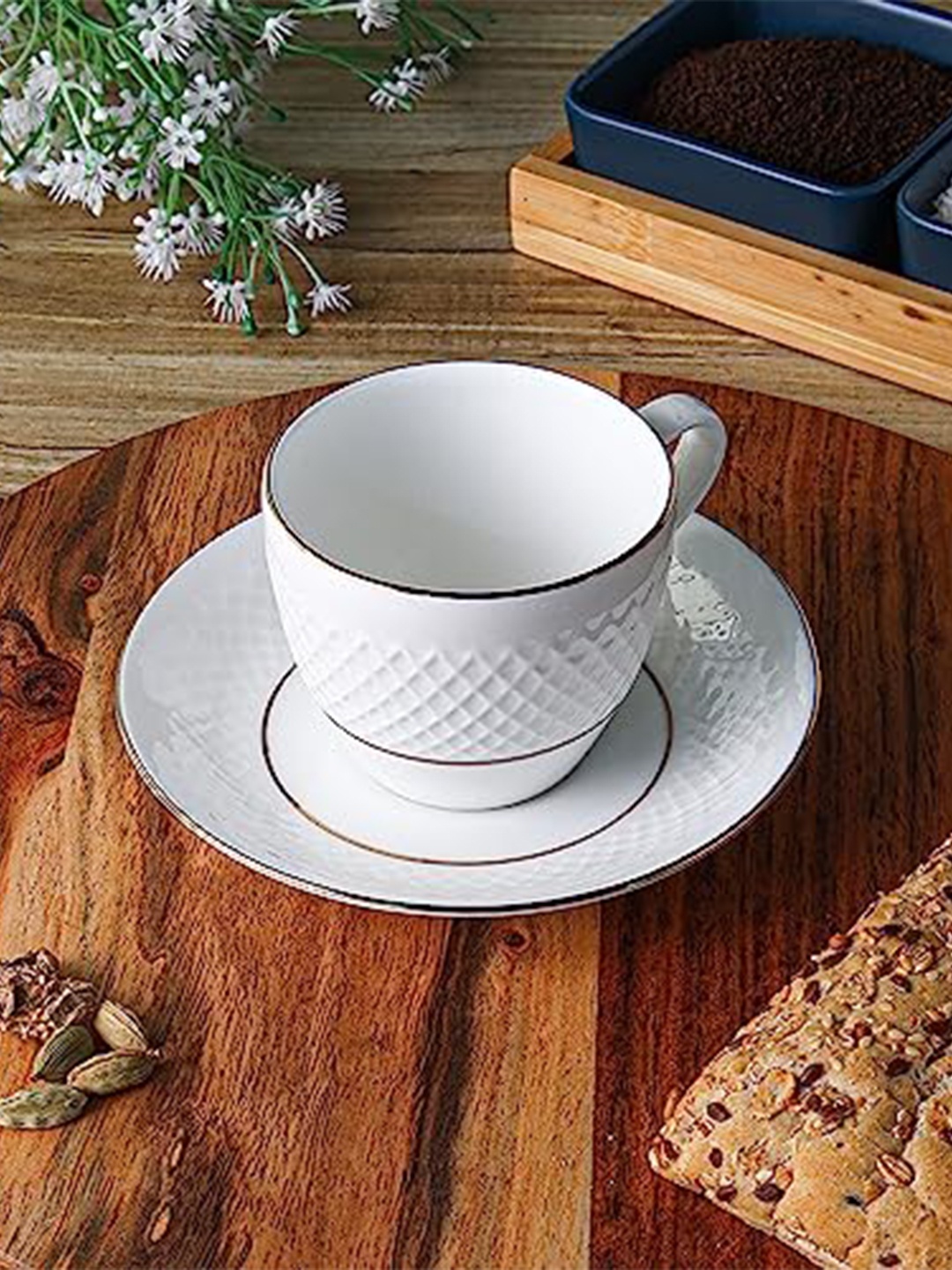 

Femora White & Gold Toned 12 Pcs Solid Ceramic Glossy Cups and Saucers 200ml