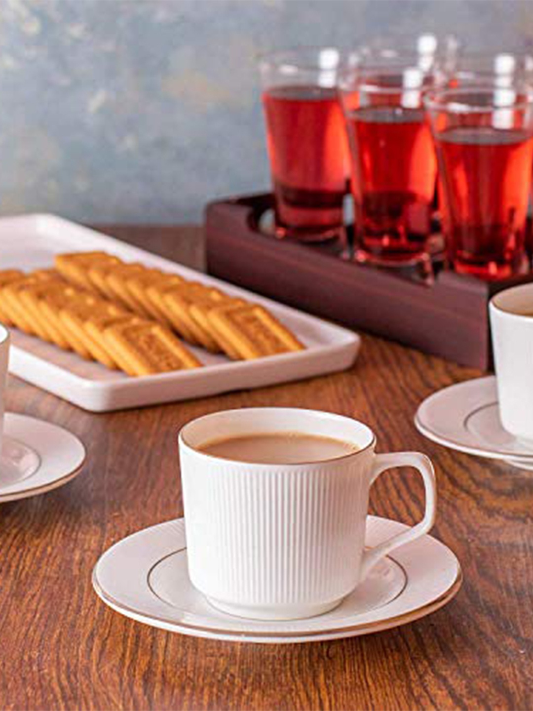 

Femora White & Gold Toned 12 Pcs Solid Ceramic Glossy Cups and Saucers 200ml