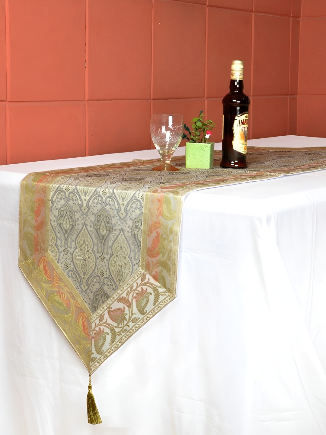 

Lal Haveli White & Gold Toned Floral Printed Table Runner