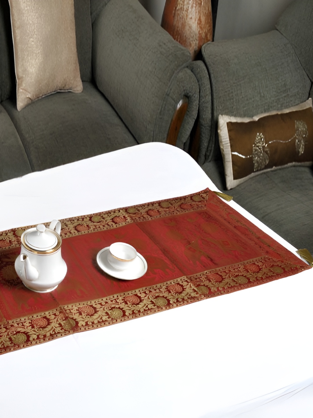 

Lal Haveli Maroon & Gold Toned Ethnic Motifs Table Runner